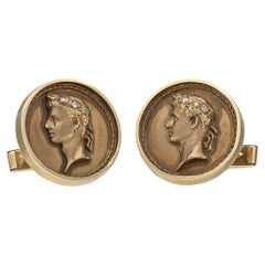 Manschettenknöpfe aus Gold und Diamanten mit menschlicher Figur
