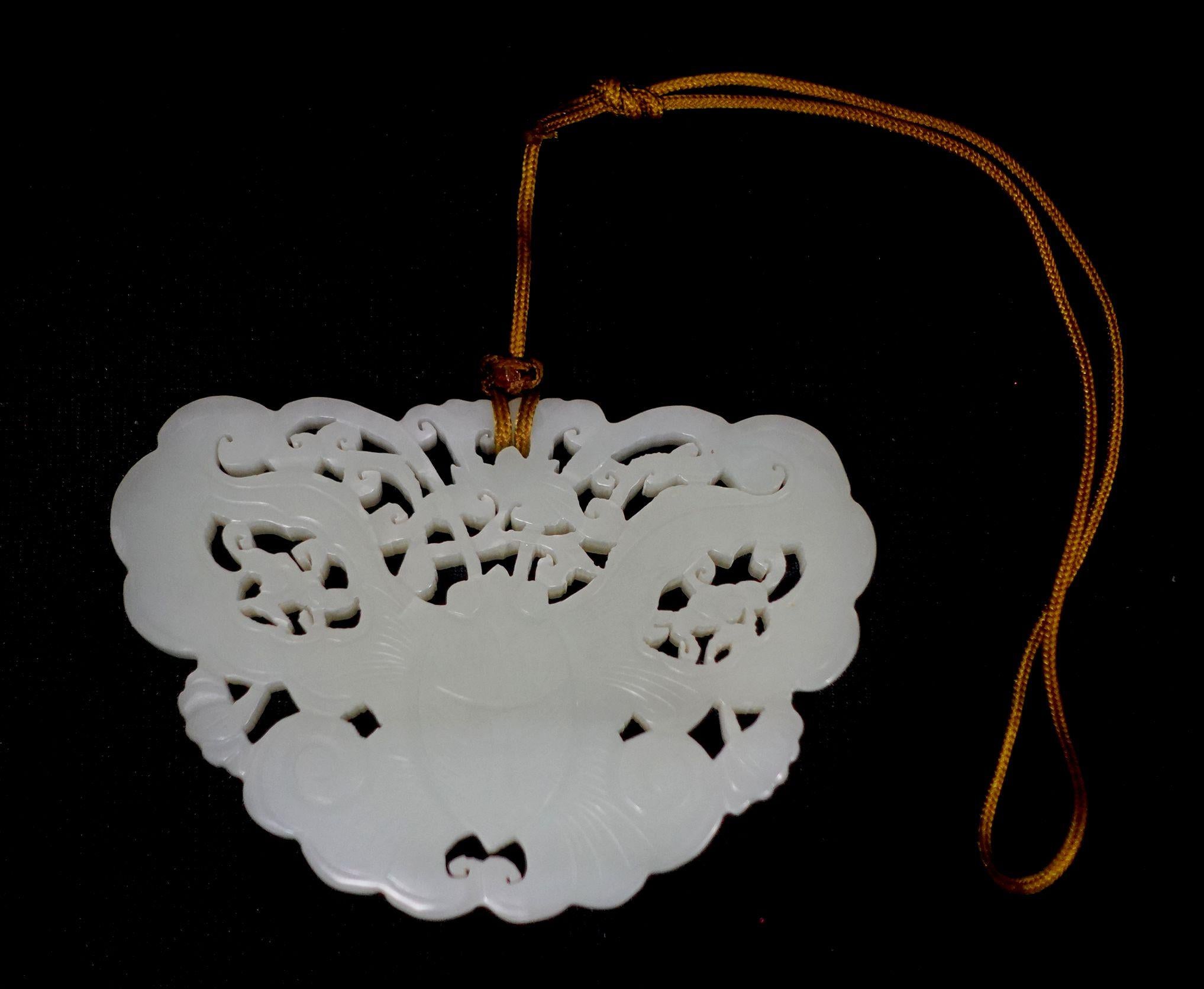 Antique A Chinese Carved Hetain White Jade Pendant, 19th-century.

-Dimensions and Density-

Jade:
Width: 3.5