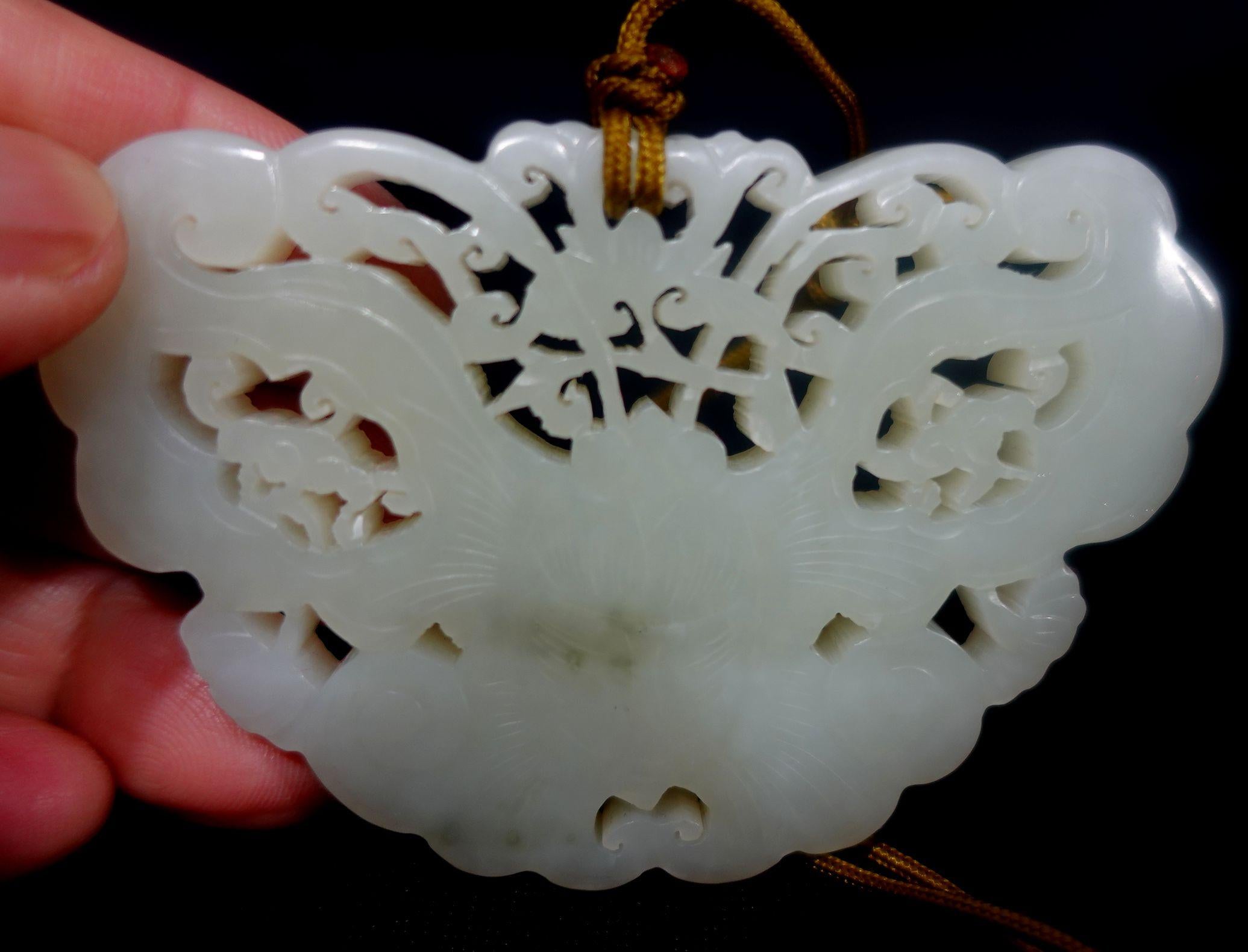 Antique A Chinese Chinese Carved Hetain White Jade Pendant, 19th Century In Excellent Condition For Sale In Norton, MA