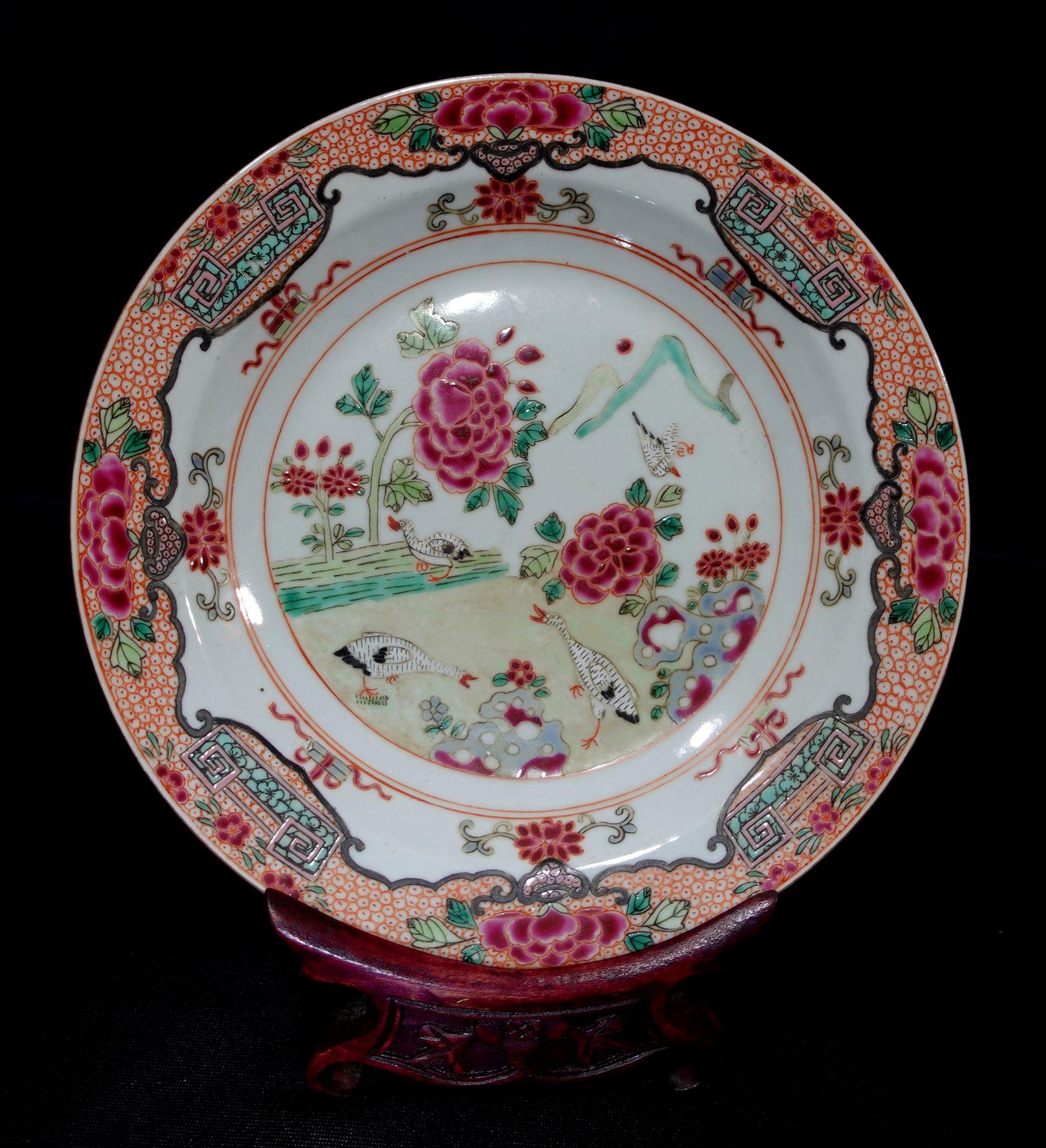 Chinese export porcelain famille rose plate decorated with geese in a garden, 18th Century. Diameter 9in. The special wood stand is included.


 