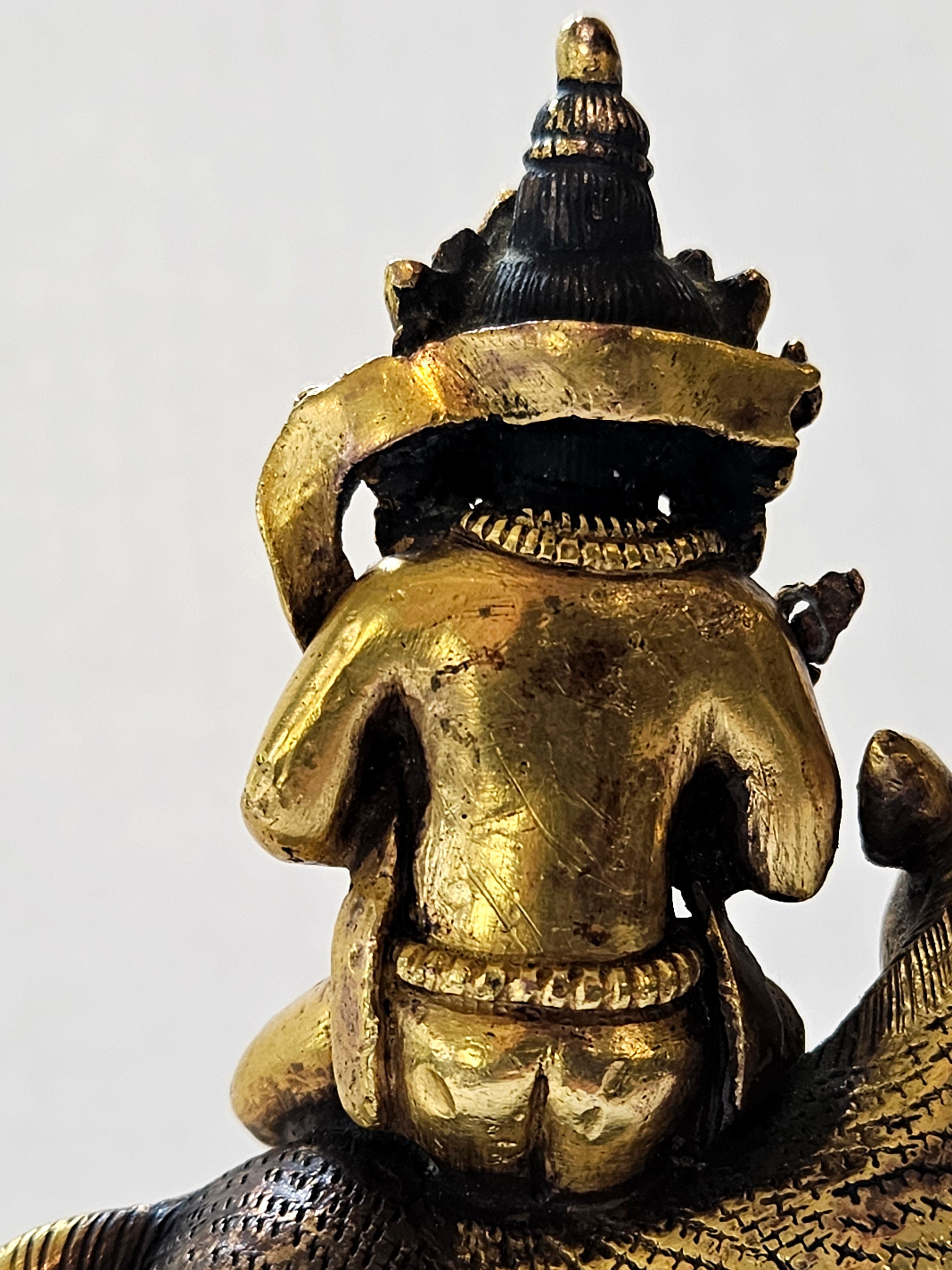 Antique A Sino-Tibetan Gilt Bronze Figure on Hardwood Stand, 18th Century For Sale 7