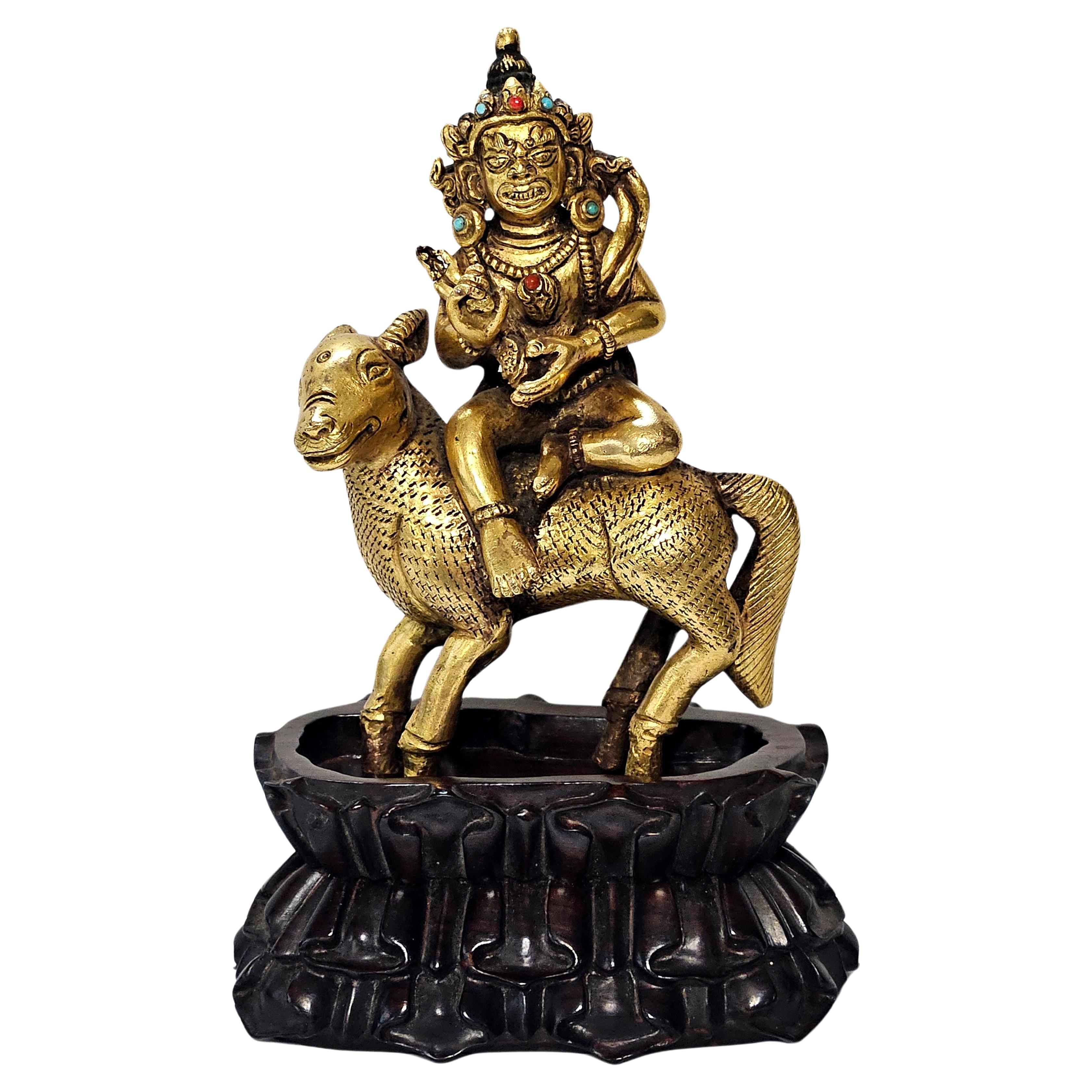 Antique A Sino-Tibetan Gilt Bronze Figure on Hardwood Stand, 18th Century For Sale
