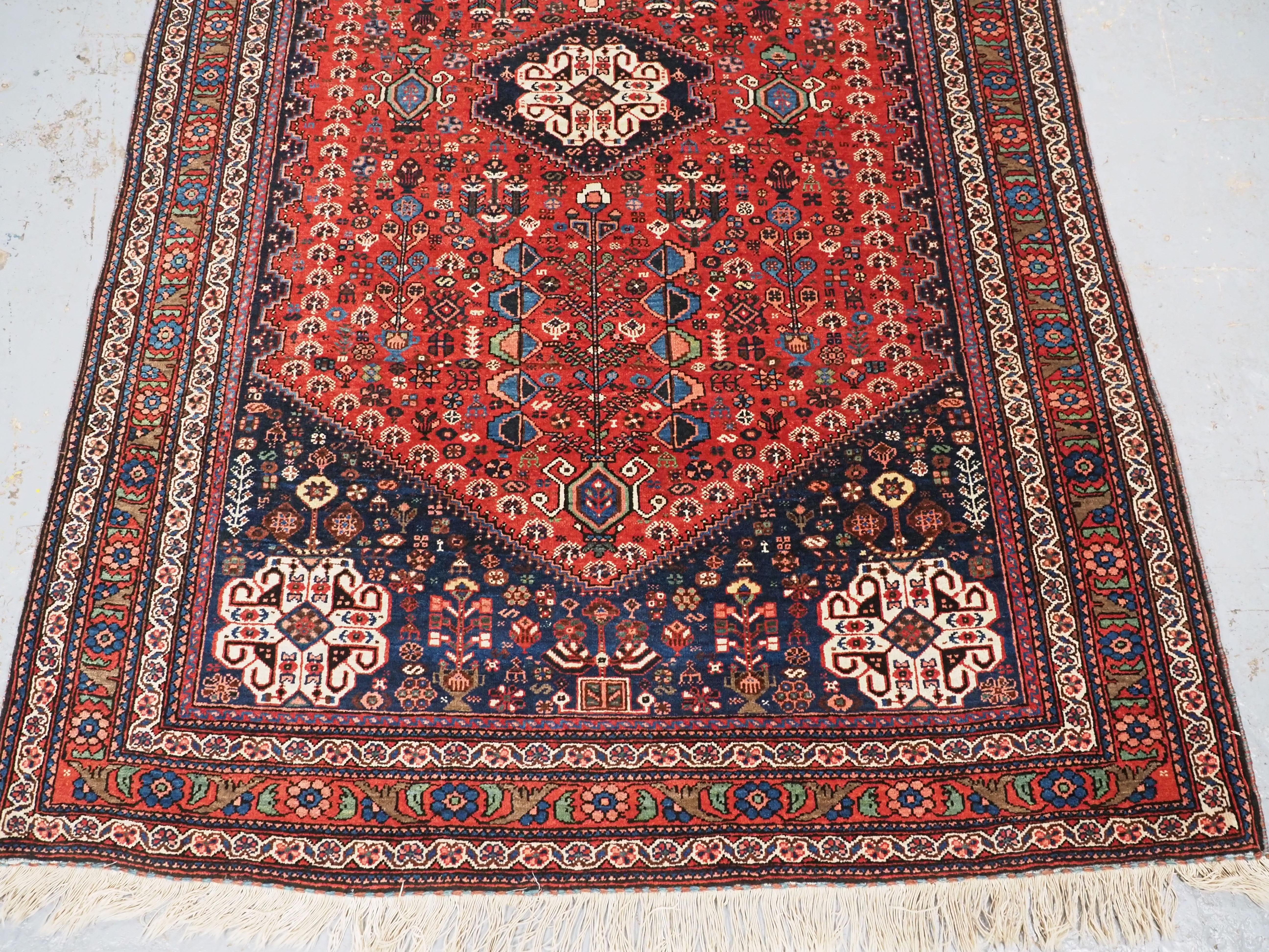 Early 20th Century Antique Abedeh rug with the tribal medallion design.  Circa 1900/20. For Sale