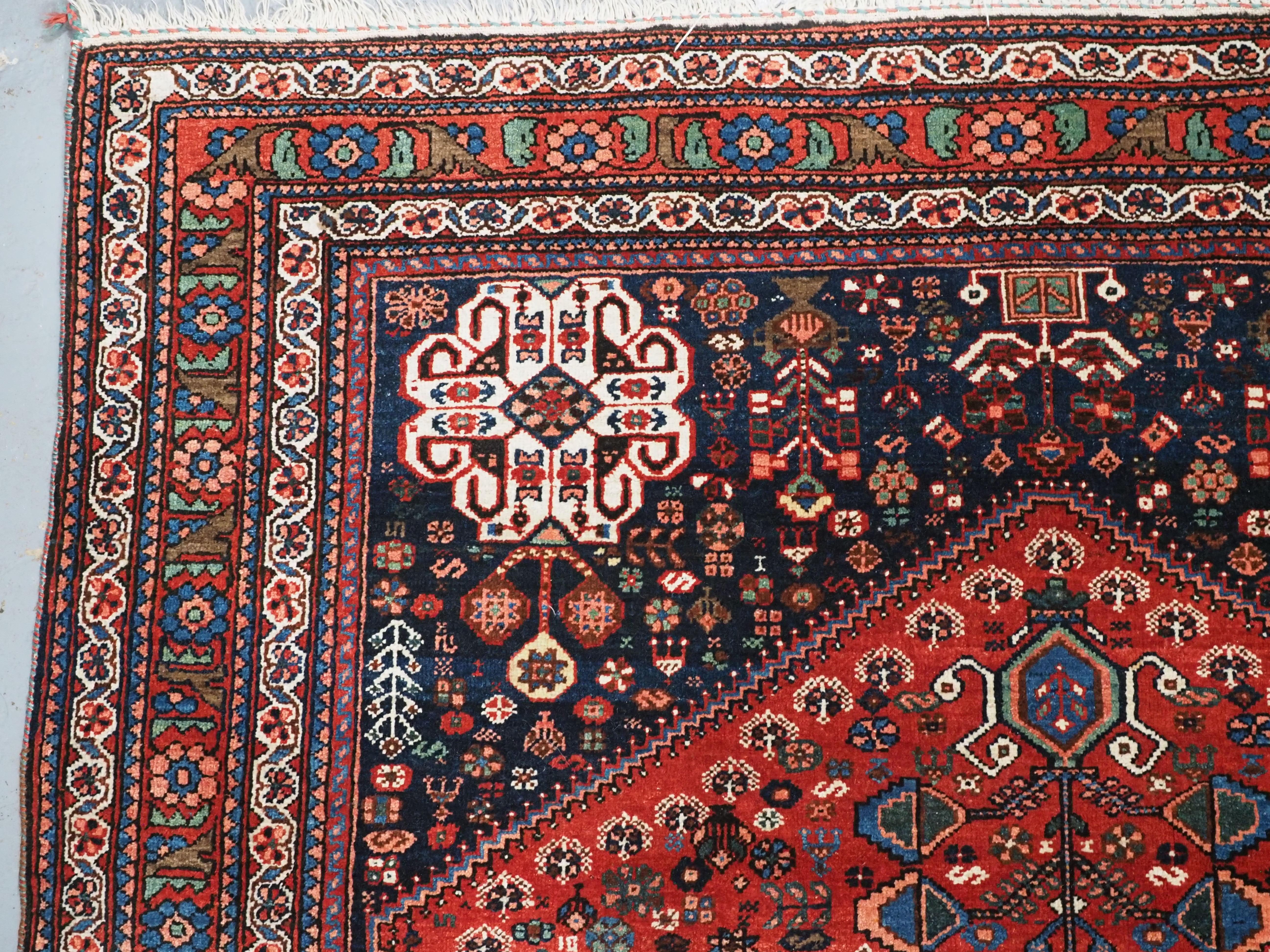 Wool Antique Abedeh rug with the tribal medallion design.  Circa 1900/20. For Sale