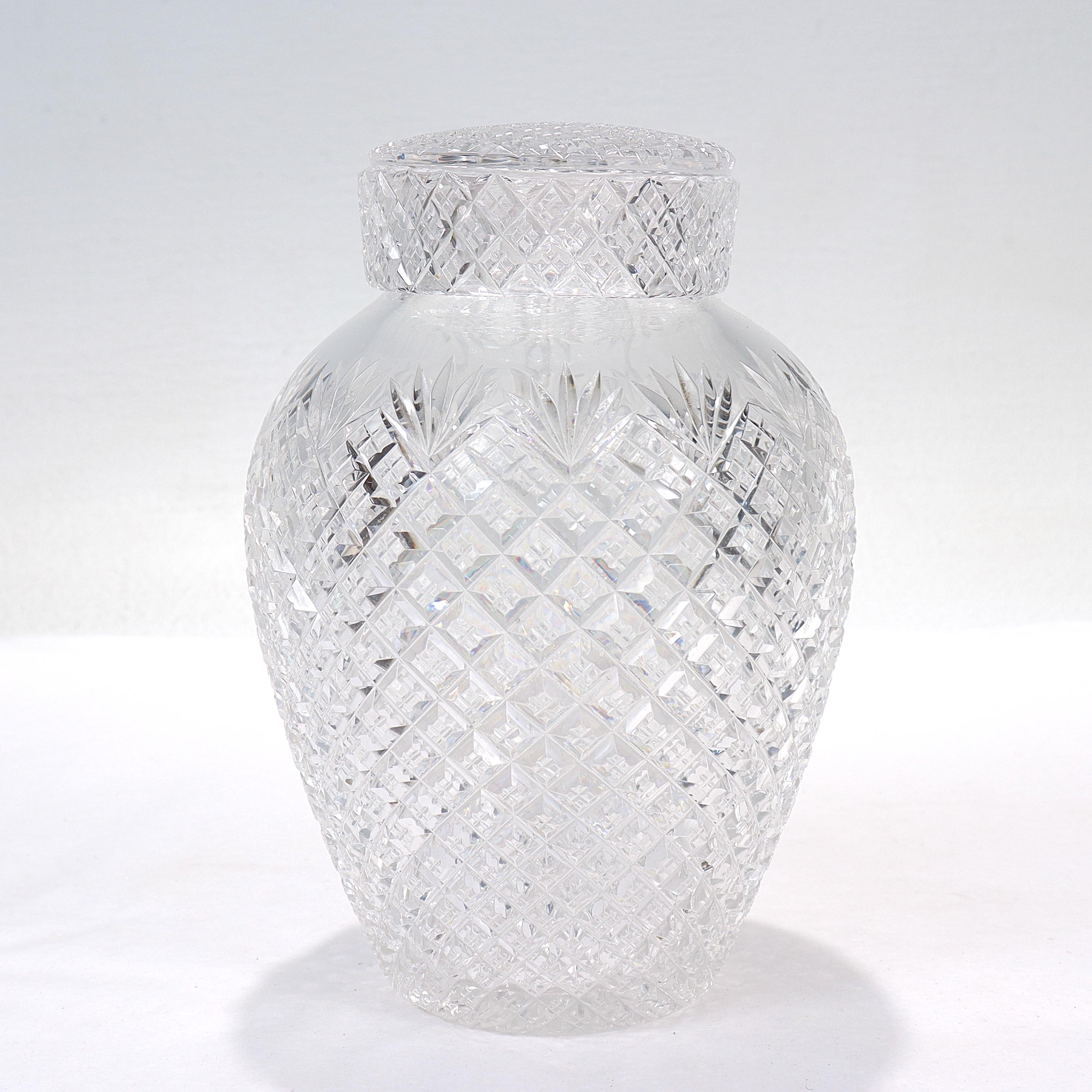 A fine antique ABP cut glass tea caddy.

In the Strawberry Diamond & Fan pattern.

Comprising a cut glass body, conforming internal cover, and cut glass lid. 

The lid and body each with overall cut decoration throughout.

The base has a
