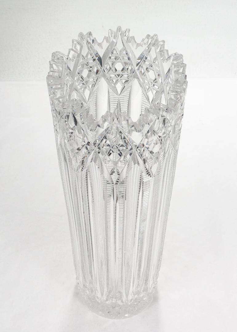 A fine early cylindrical cut glass vase.

By J. Hoare.

In the Plume or Hindoo pattern.

With large hobstar cuts and a prism and concave pillar cut body.

Simply a wonderful early American Brilliant Period vase!

Date:
Late 19th or Early