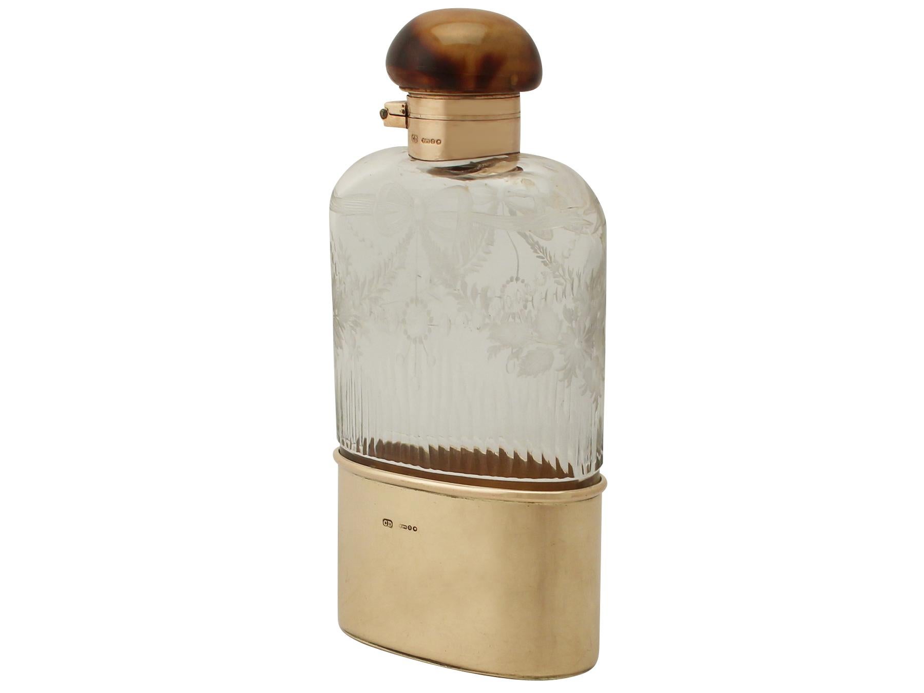 An exceptional, fine and impressive antique George V acid etched, cut glass and English 9 carat yellow gold hip flask; an addition to our silver mounted glass collection

This exceptional George V antique glass and silver hip flask has a