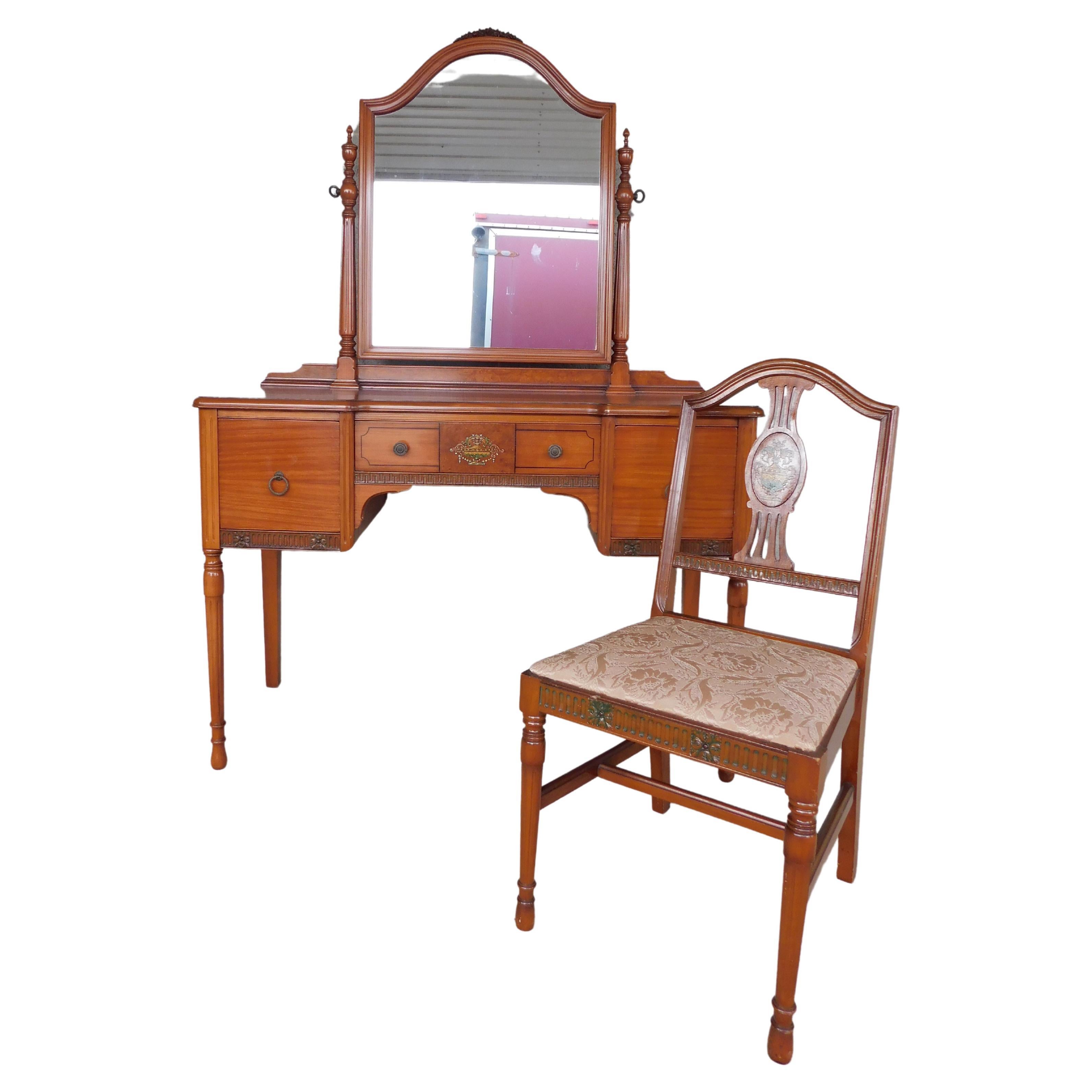 Antique Adams / Regency Style Satinwood Vanity with Chair & Bench
Medium Tone Finished Satinwood, Greek Key Accented with Pencil Inlays surrounding the drawer face,, and Painted Centered Burl Walnut Veneer with Hand Painted Urn Motif, Attached