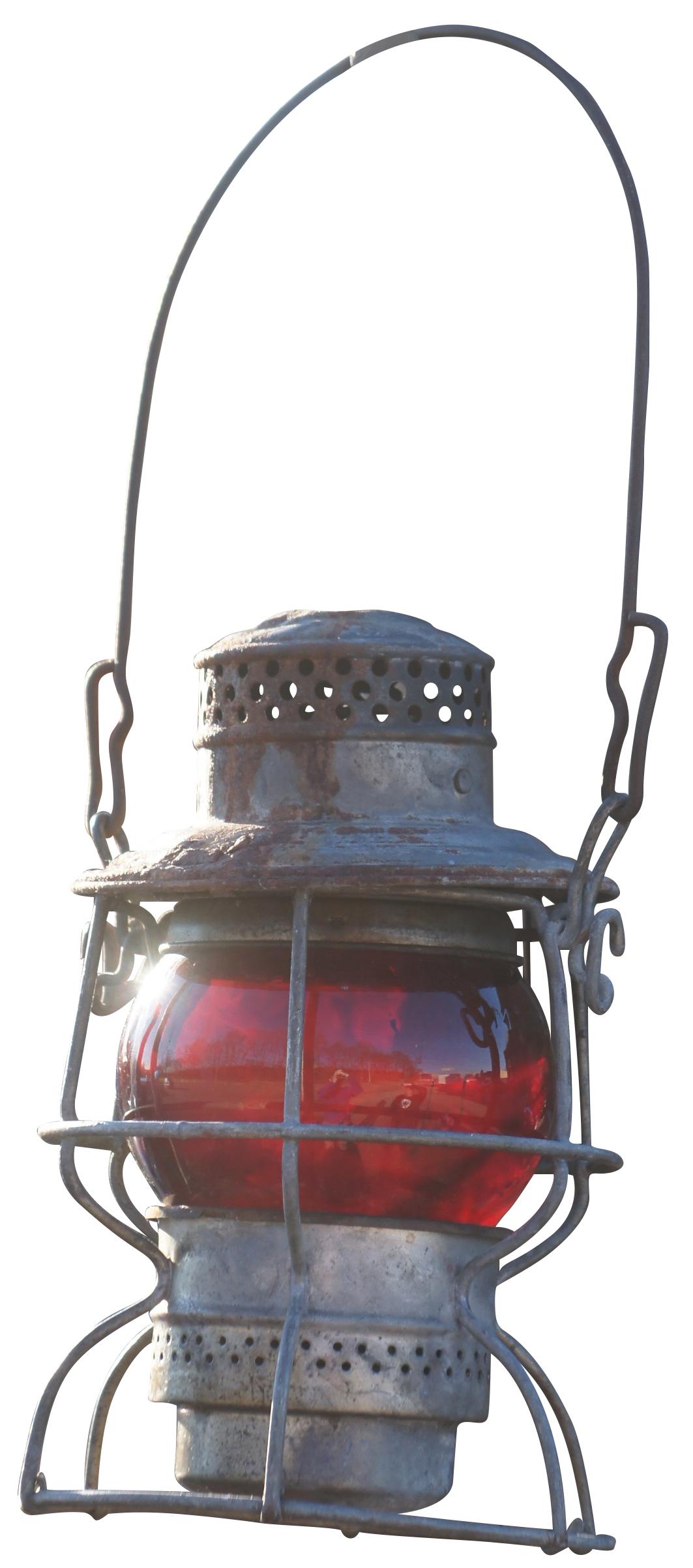 Antique Adams & Westlake Adlake oil lantern featuring ruby red globe and metal frame. Measure:3