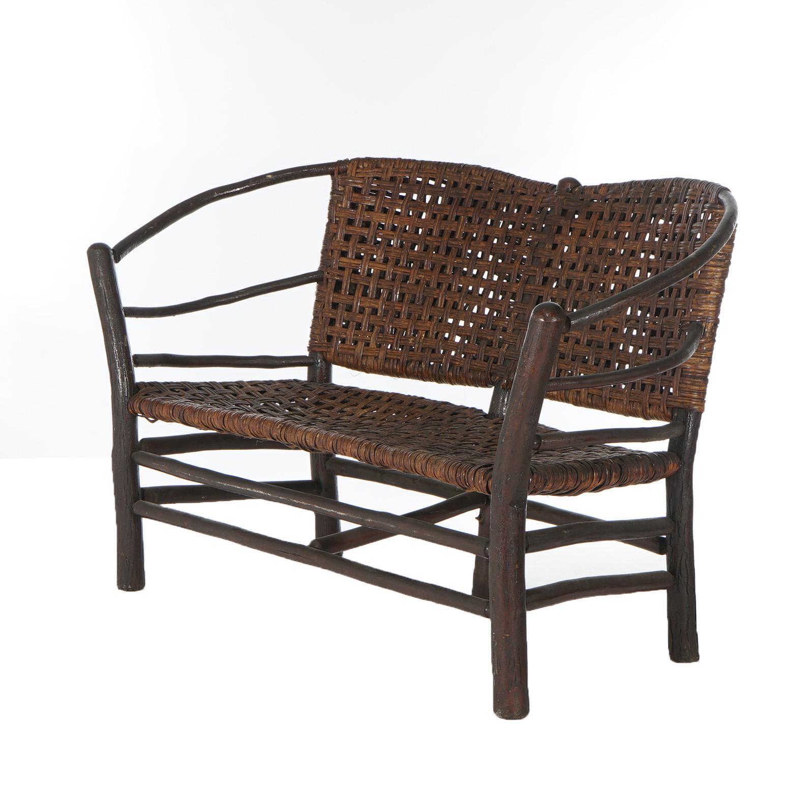 ***Ask About Reduced In-House Delivery Rates - Reliable Professional Service & Fully Insured***

Antique Adirondack Old Hickory Stick Form & Splint Settee C1920

Measures- 34''H x 55.5''W x 28.5''D; 15'' SH