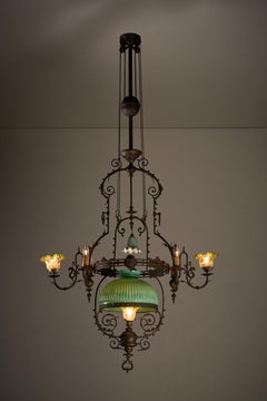 Antique Adjustable Height Chandelier with Original Glasswork and Brass Detailing