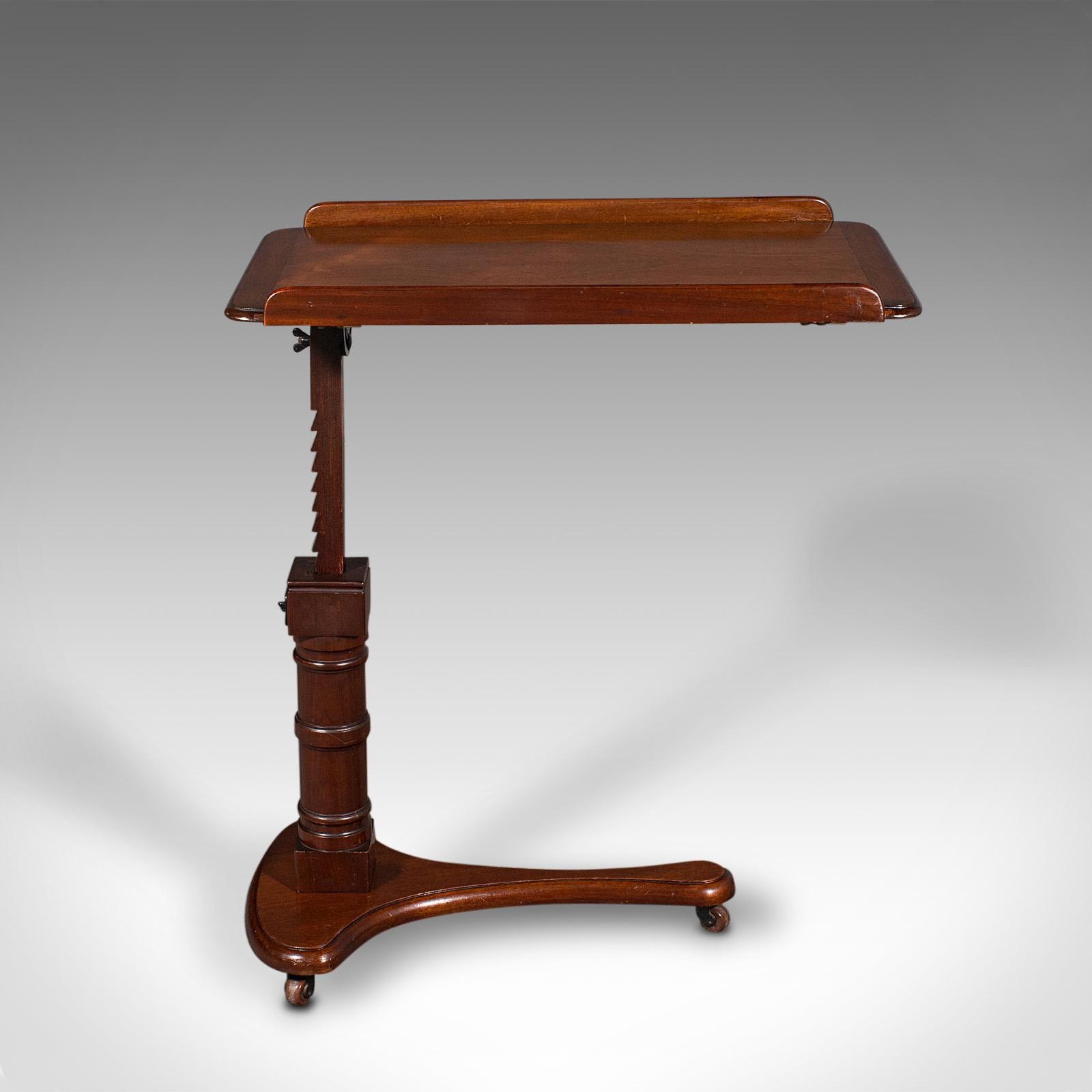 This is an antique adjustable reading table. An English, mahogany rotating lectern or recital stand, dating to the Edwardian period, circa 1910.

Offering a multitude of adjustment and versatile for differing uses
Displays a desirable aged patina