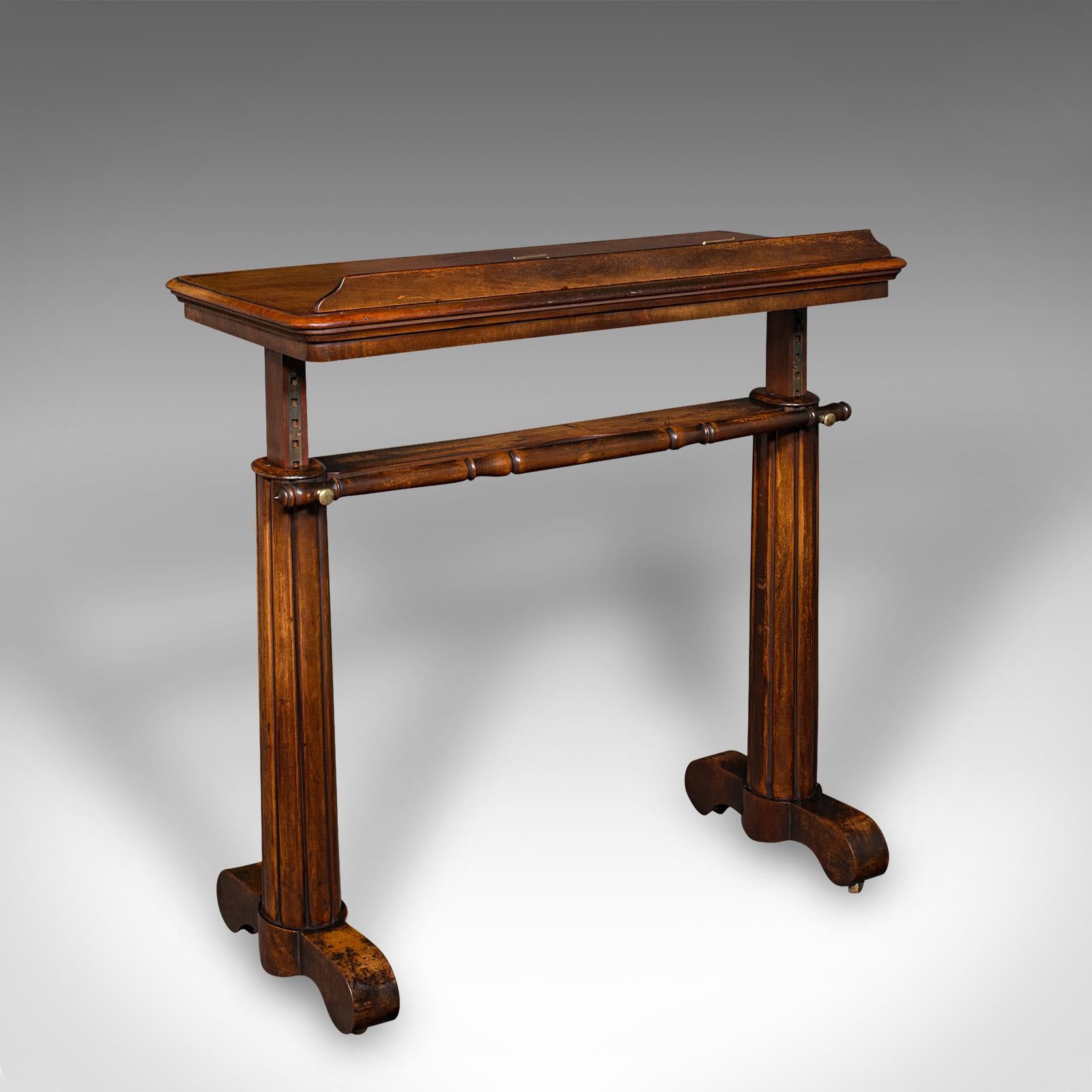 This is an antique adjustable reading table. An English, mahogany event lectern or recital stand, dating to the William IV period, circa 1835.

Exceptional and fascinating reading table of the finest quality
Displays a desirable aged patina and