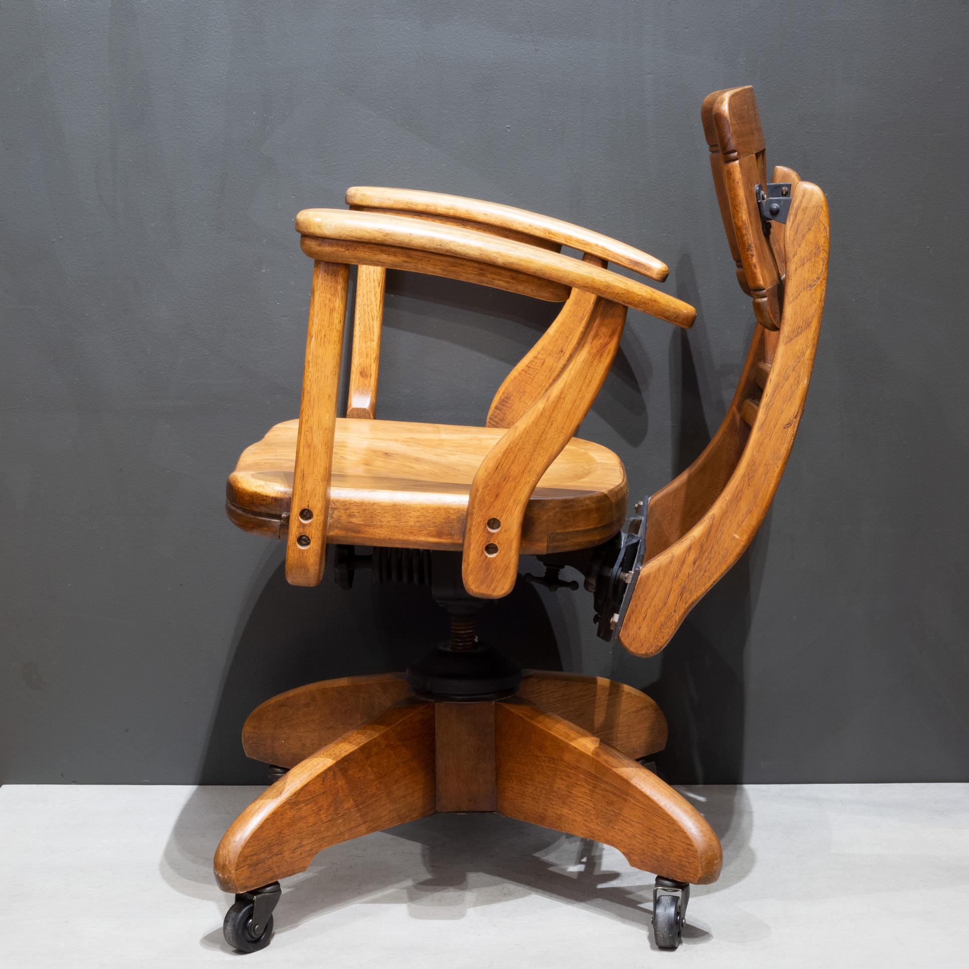 Cast Rare Antique Adjustable Swivel Oak Desk Chair with Floating Back Rest c.1926 For Sale
