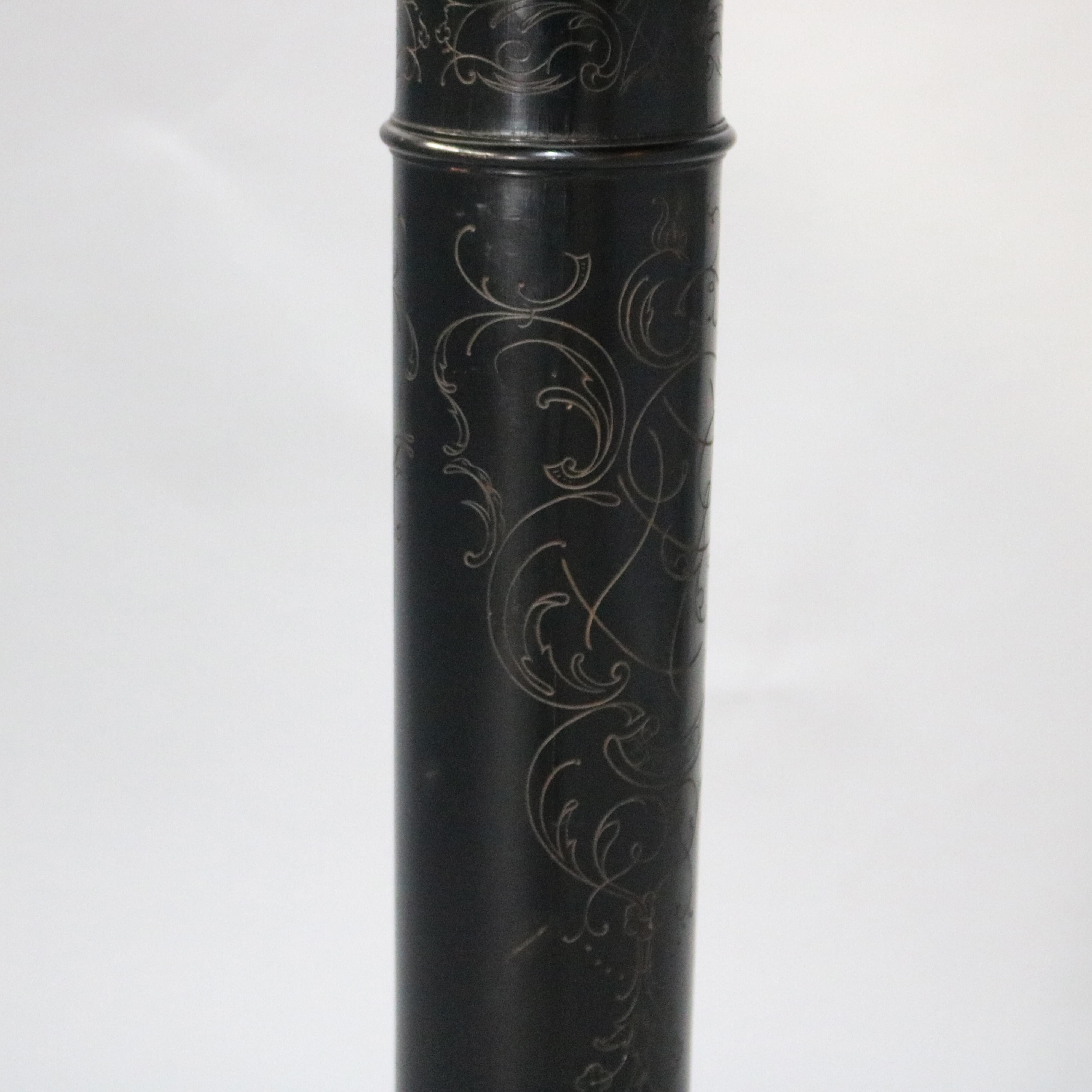 An antique aesthetic movement sculpture display pedestal offers ebonized wood construction in Doric column form with scroll and foliate decoration, circa 1880

Measures: 41