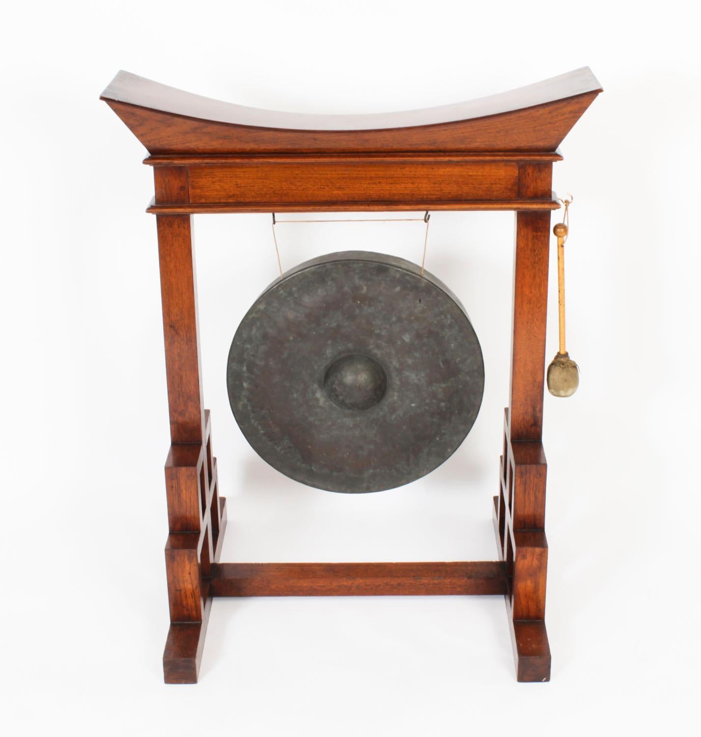 A superb quality Aesthetic Movement Anglo-Japanese dinner gong in the manner of Edward William Godwin,  Circa 1880 in date.

This fabulous gong is extremely well made with careful attention to detail, all the joints are pegged, and a very resonant