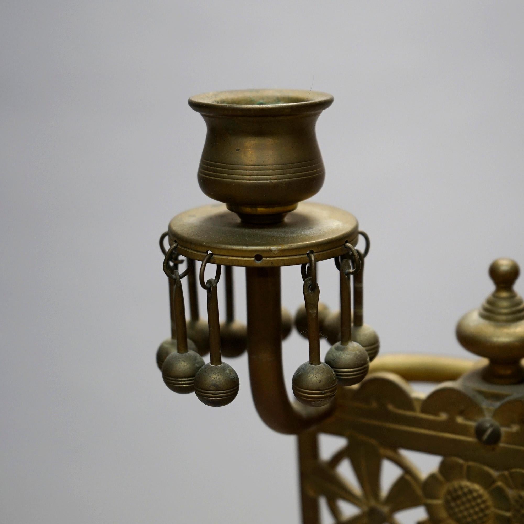 Cast Antique Aesthetic Movement Brass Candelabra with Stylized Flowers Circa 1880