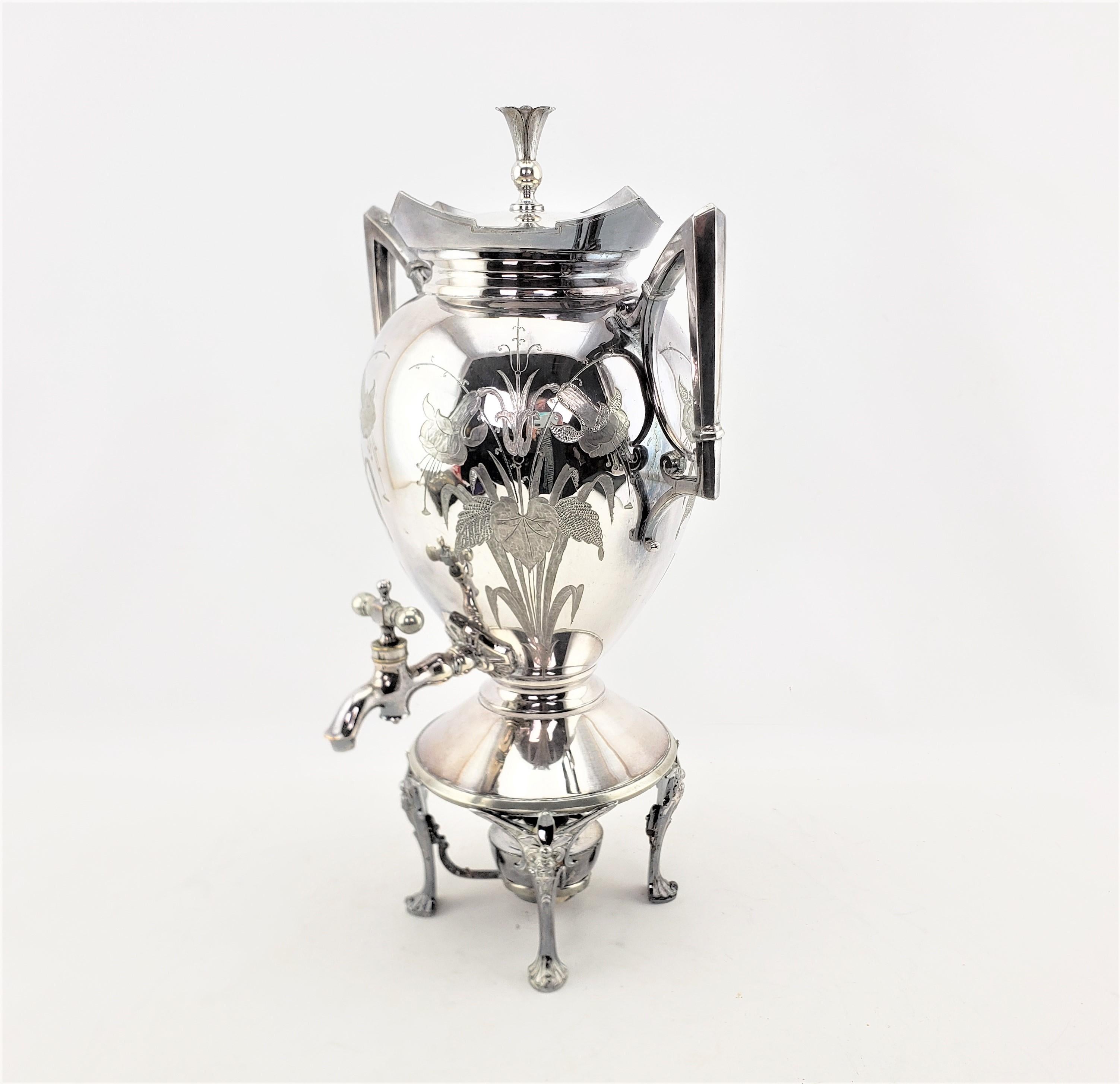 This antique silver plated hot water kettle was made by the Meridian Company of the United States in approximately 1890 in the period Aesthetic Movement style. The kettle has an egg shaped design with towering squared legs and accenting handles with