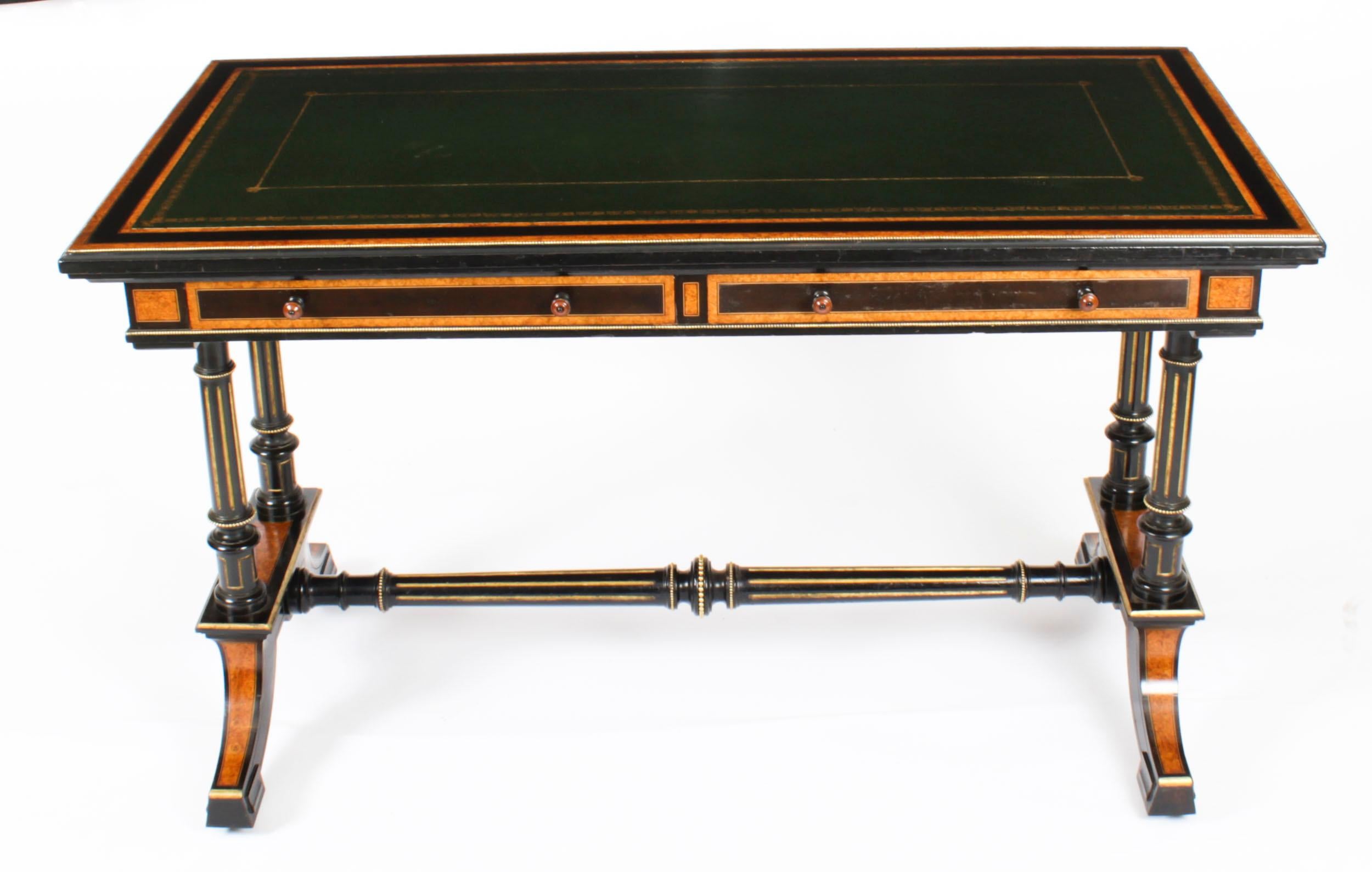 This is an elegant antique aesthetic period burr maple and ebonized writing table, stamped 'Edwards & Roberts' circa 1870 in date.
 
This elegant desk is crafted from the most beautiful maple with ebony banded decoration and ormolu beaded