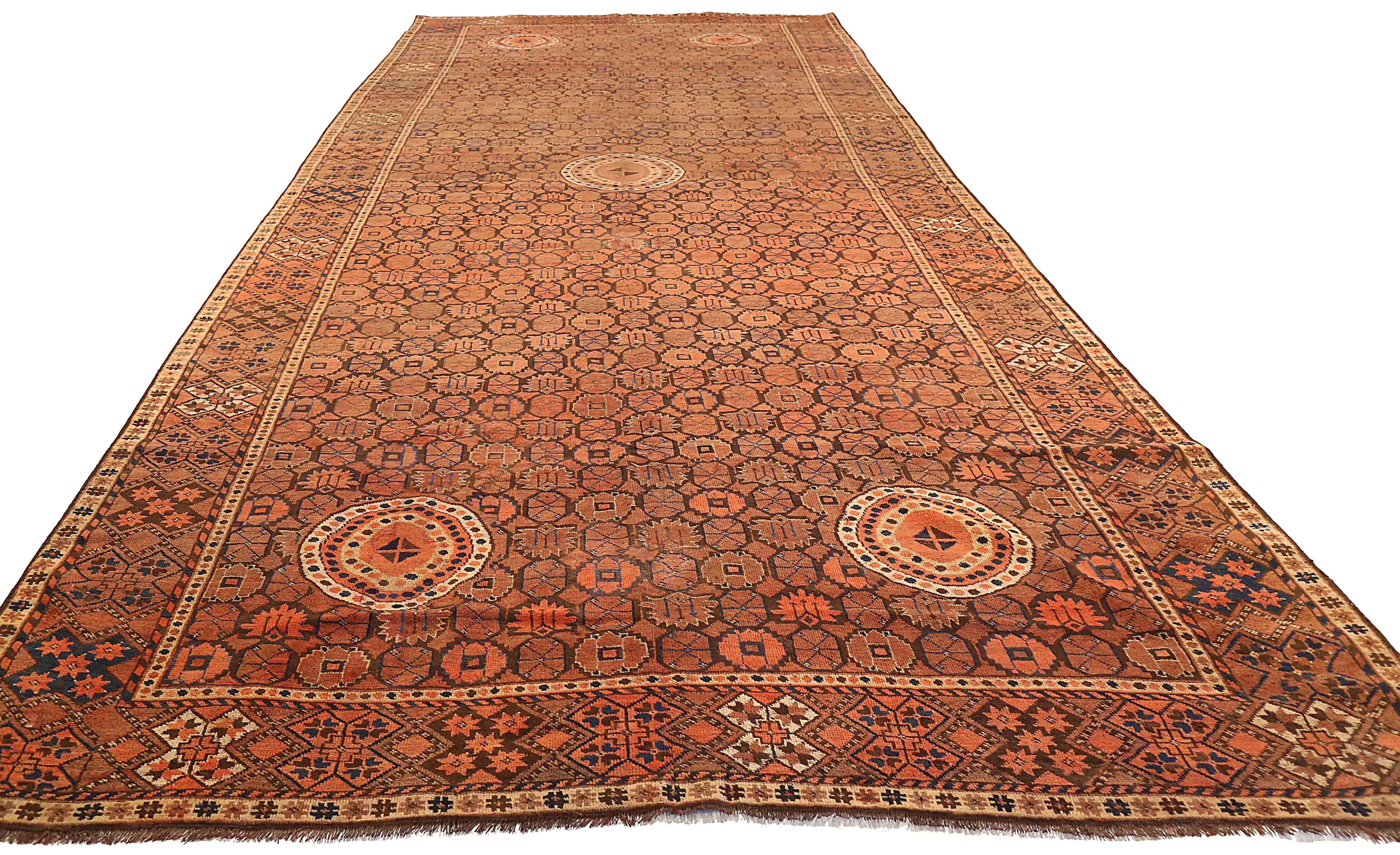 Antique Afghan area rug handwoven from the finest sheep’s wool. It’s colored with all-natural vegetable dyes that are safe for humans and pets. It’s a traditional Bashir design handwoven by expert artisans. It’s a lovely area rug that can be