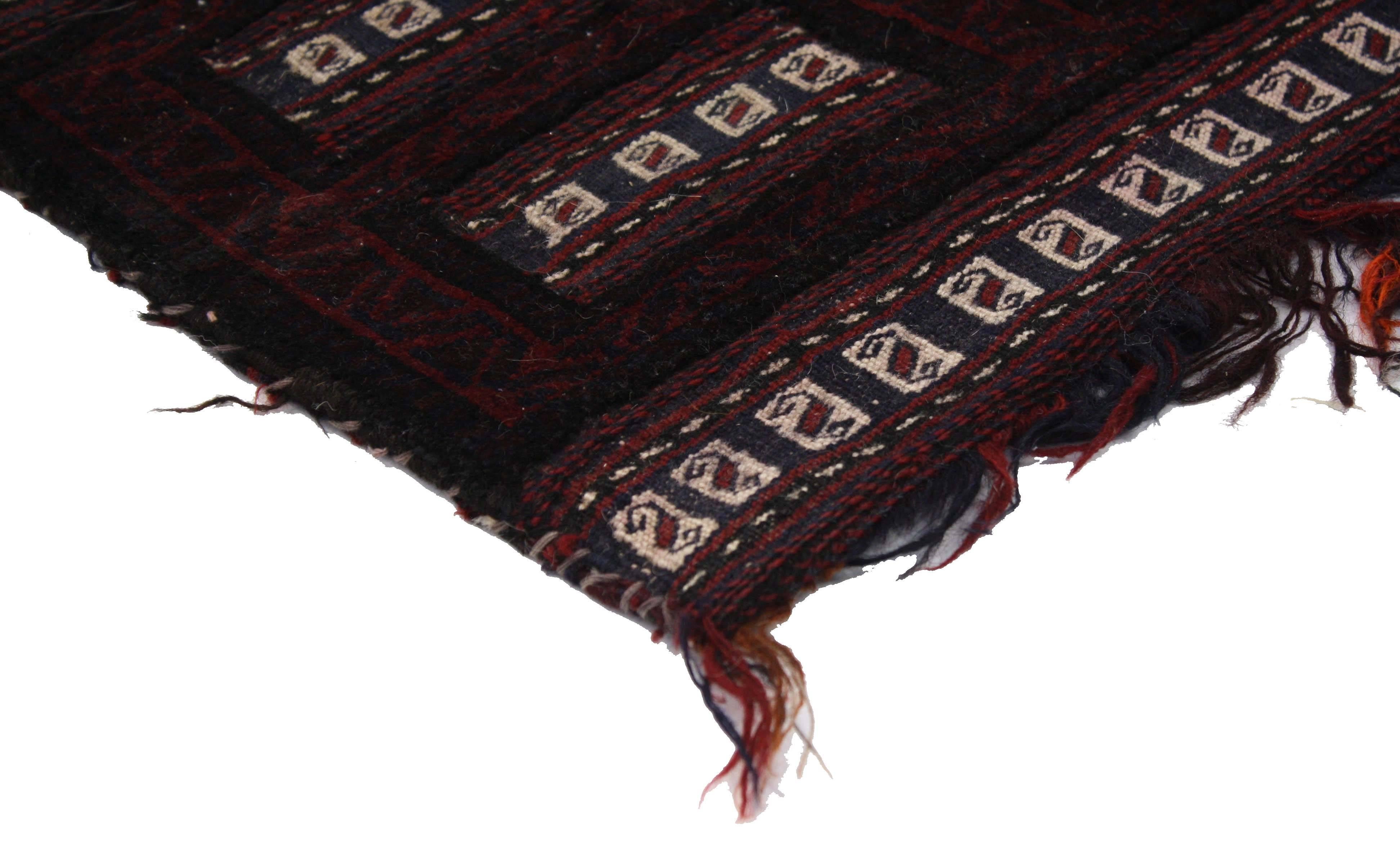 76638, antique Afghan Balouch salt bag, wall hanging, Afghan Tapestry, Tribal textile. This hand knotted wool antique Afghan Balouch salt bag features ancient tribal motifs, S-hooks, and uneven fringe hangs from the bottom. The Afghani Salt Bags