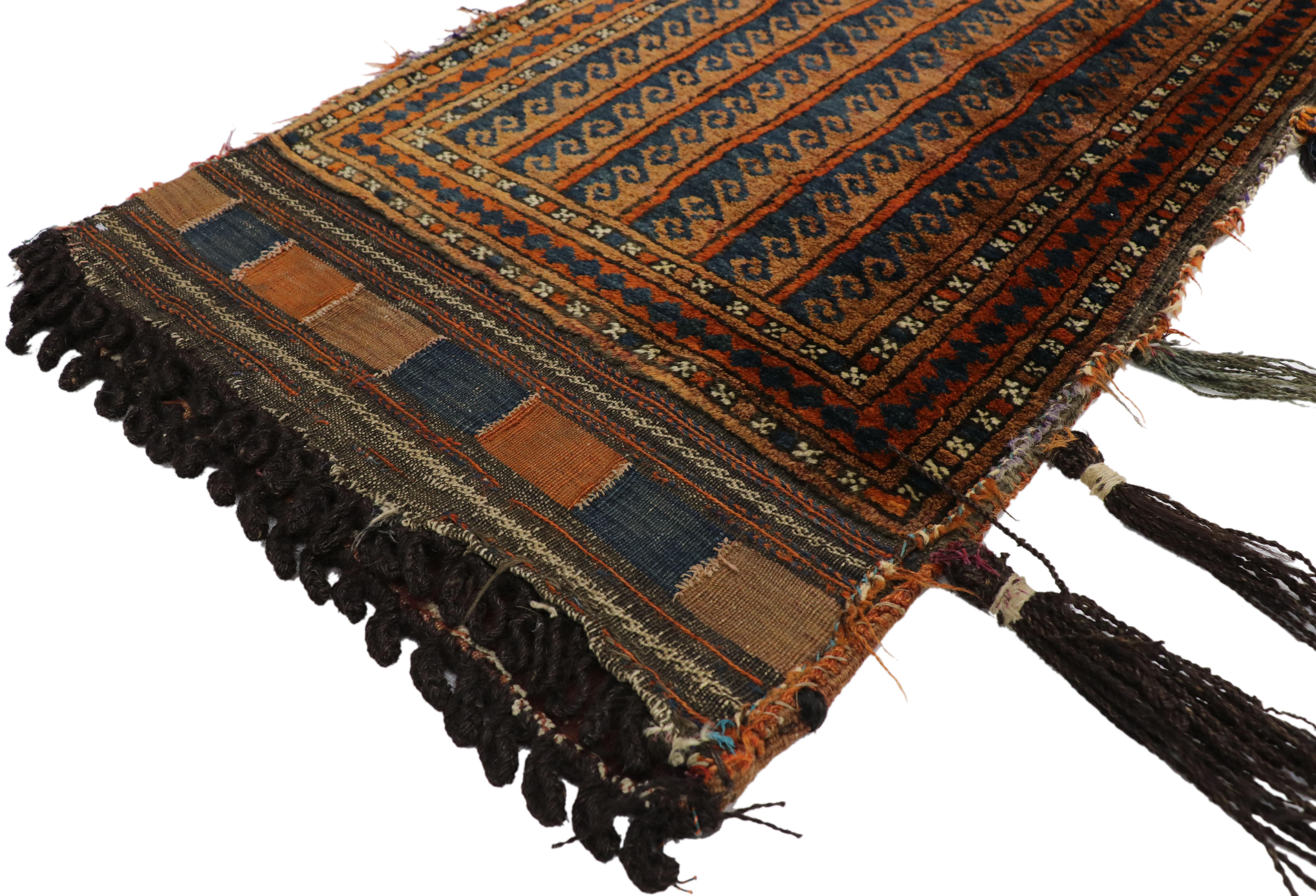 76632 antique Afghan Baluch Balisht Bag, Tribal style tapestry, nomadic wall hanging. This hand knotted wool antique Afghan bag features a series of repeating, stylized Vitruvian scroll known as a running dog border which resembles a wave. This hand