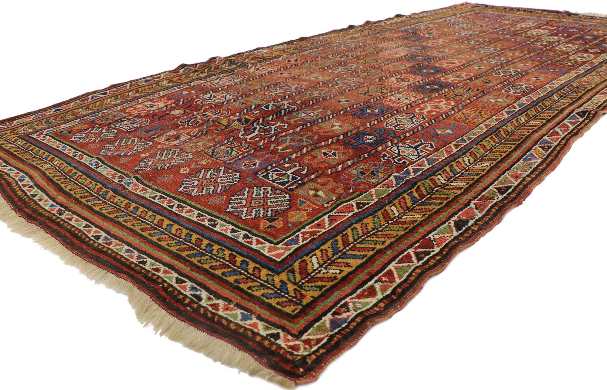 78010 Antique Afghan Bashir Rug, 05'07 x 12'06. Embark on a journey where tribal mystique seamlessly intertwines with the relaxed refined ambiance of a rustic lodge in this meticulously hand-knotted wool antique Afghan Bashir rug. Immerse yourself