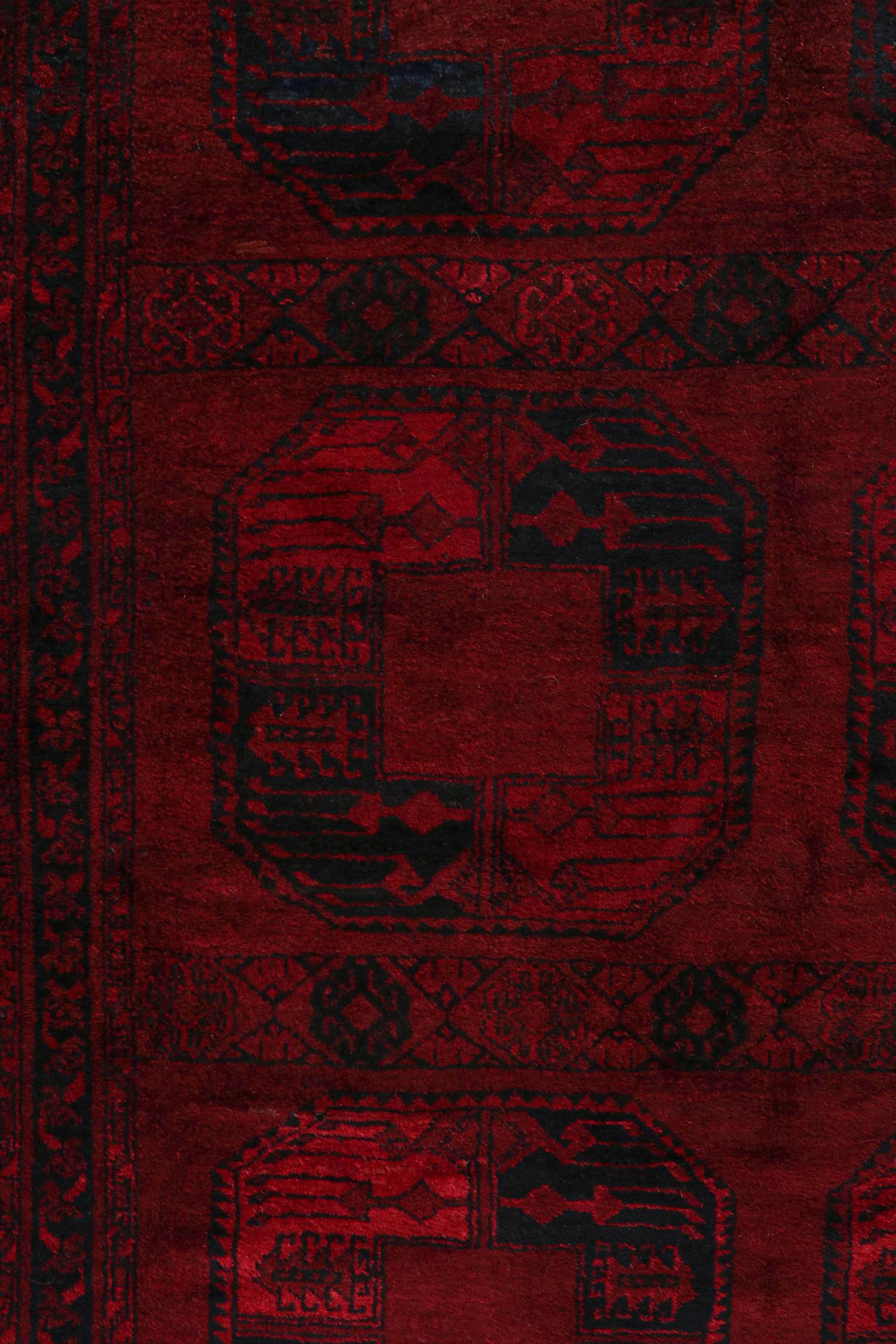 Mid-20th Century Antique Afghan Bokhara Rug in Burgundy Red and Black Medallions by Rug & Kilim For Sale