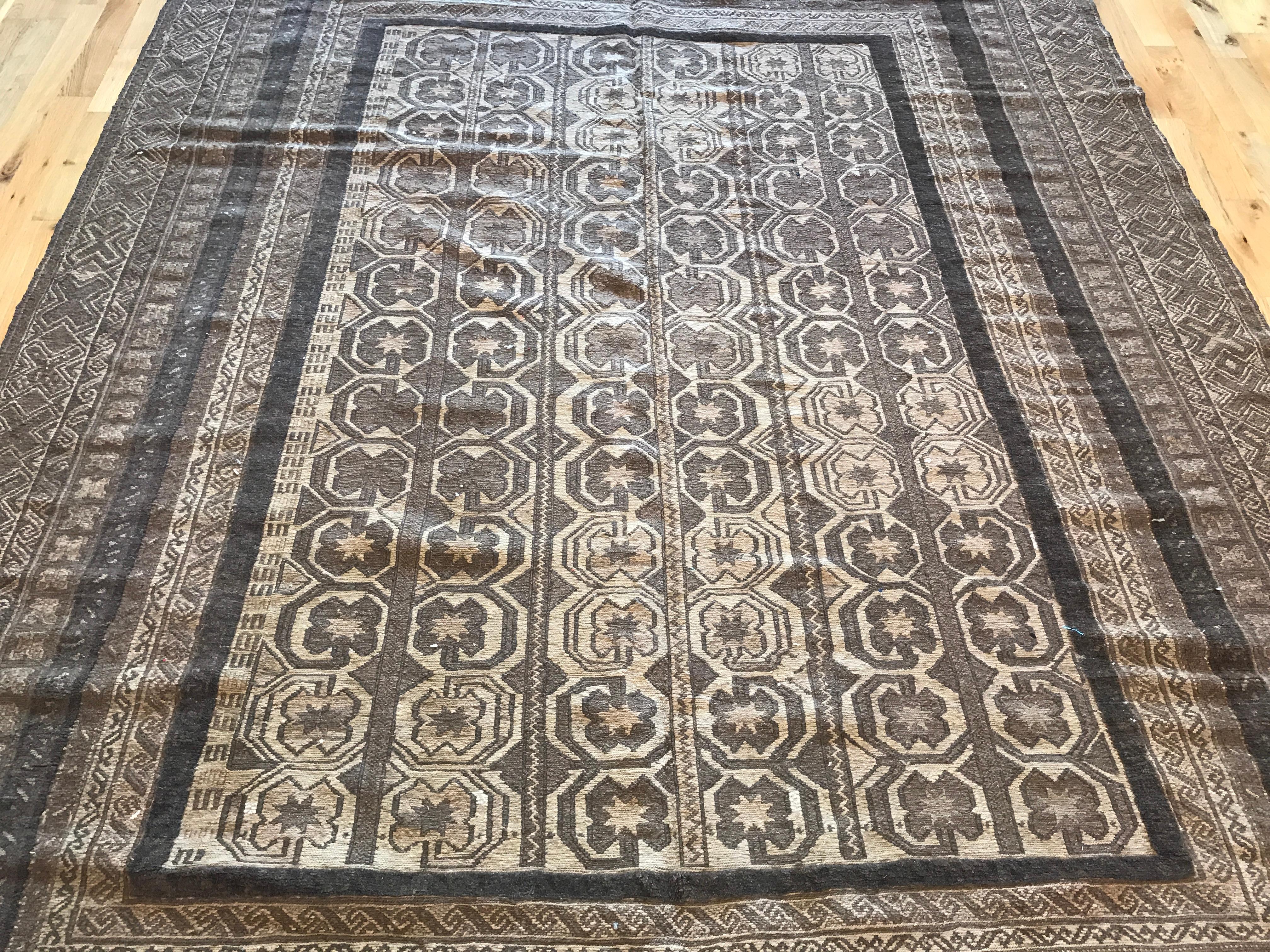 Antique Afghan rug. Measures: 6'5