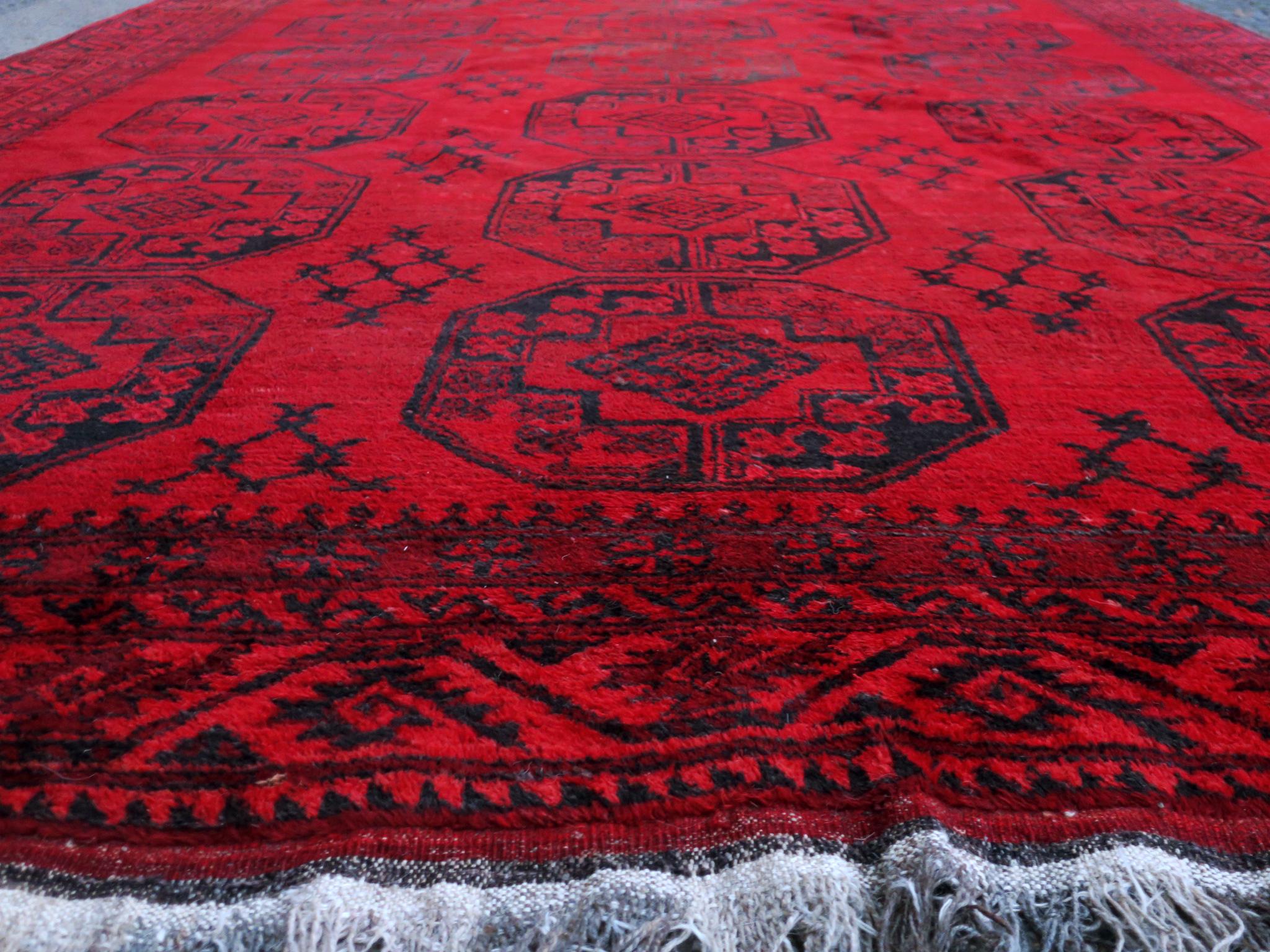 Antique Ersari Afghan rug dating from circa 1920 with rich red background color in very good condition with minimal signs of age and use.
Quite a large size.