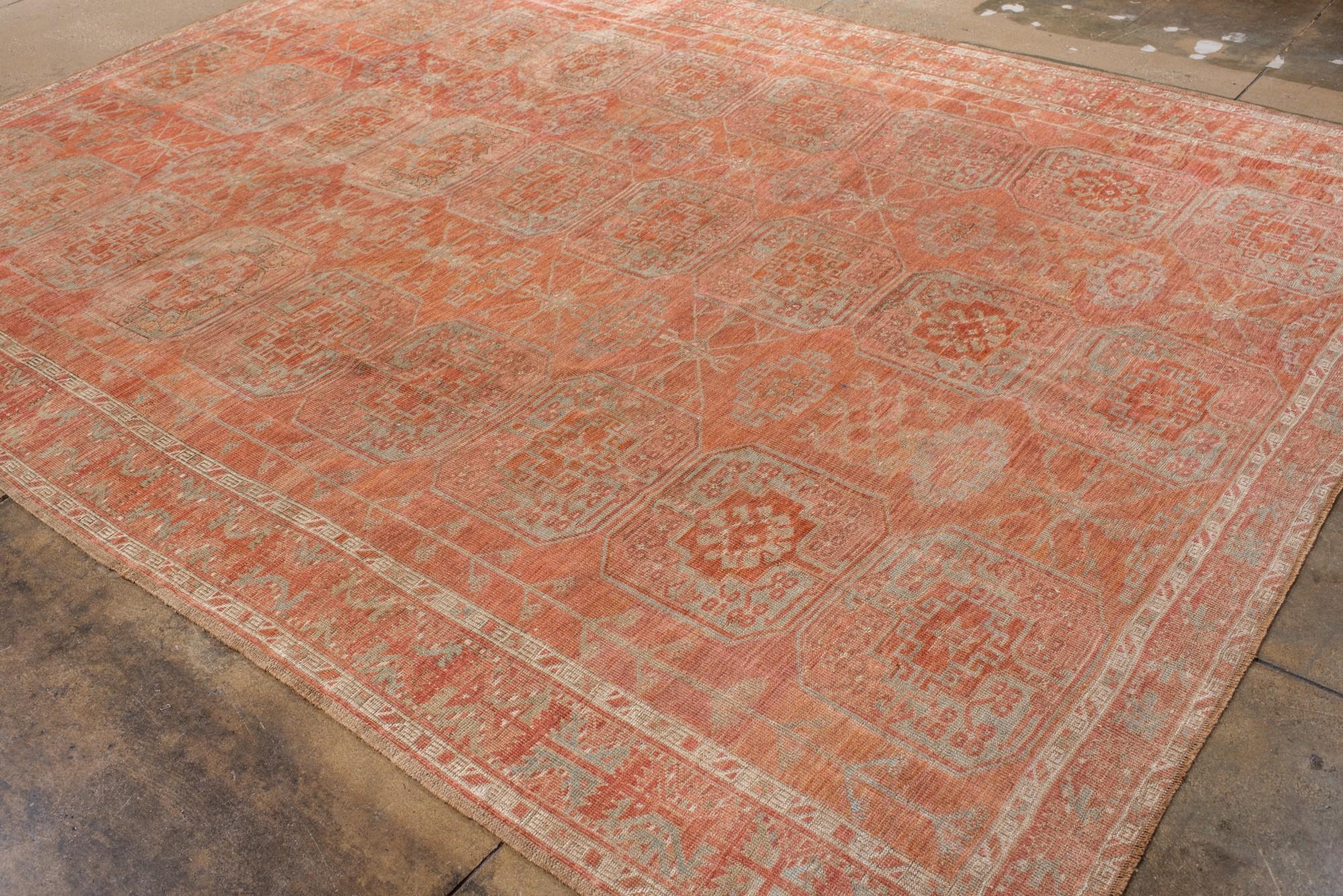 Wool Antique Afghan Rug with Repeating Gul Motifs For Sale