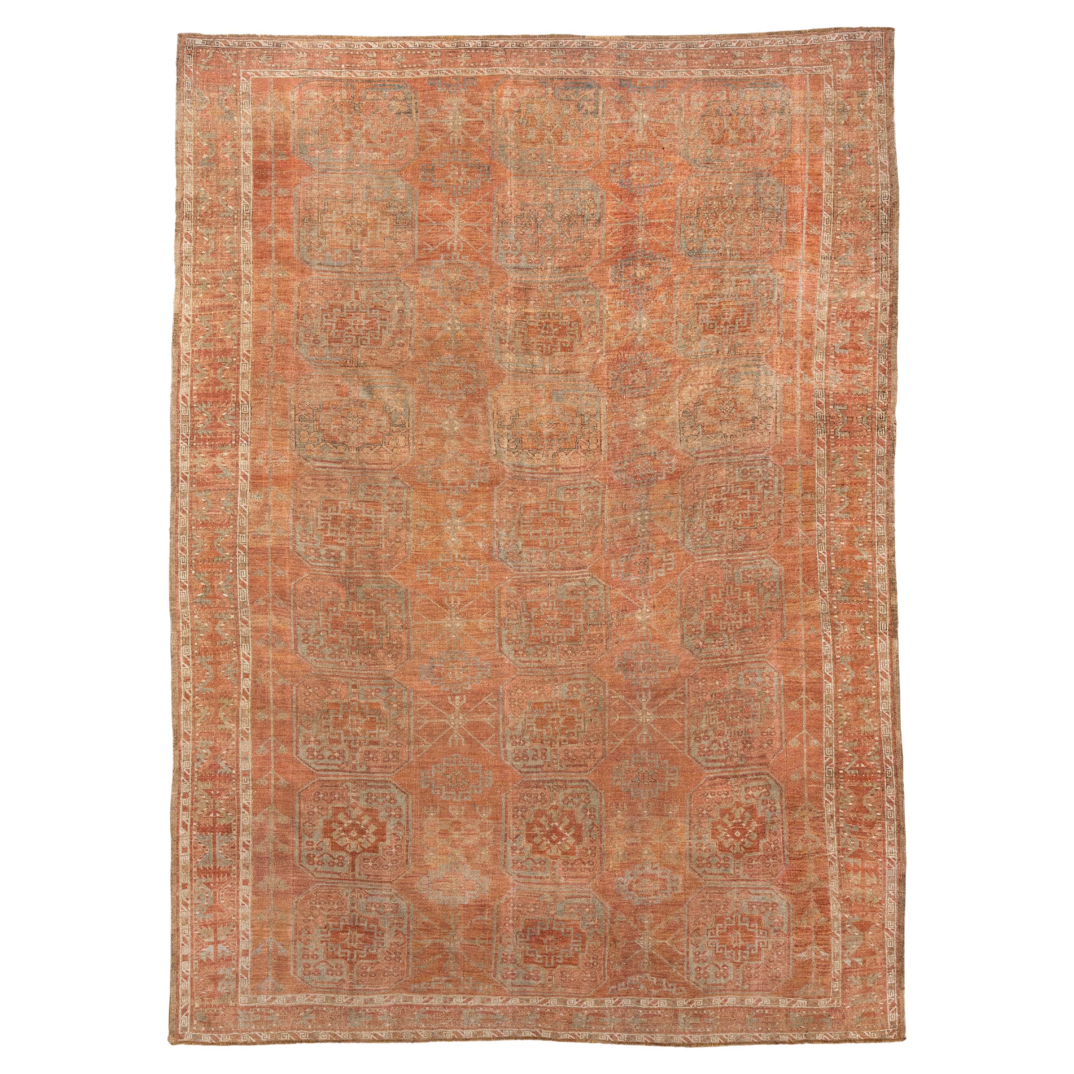 Antique Afghan Rug with Repeating Gul Motifs