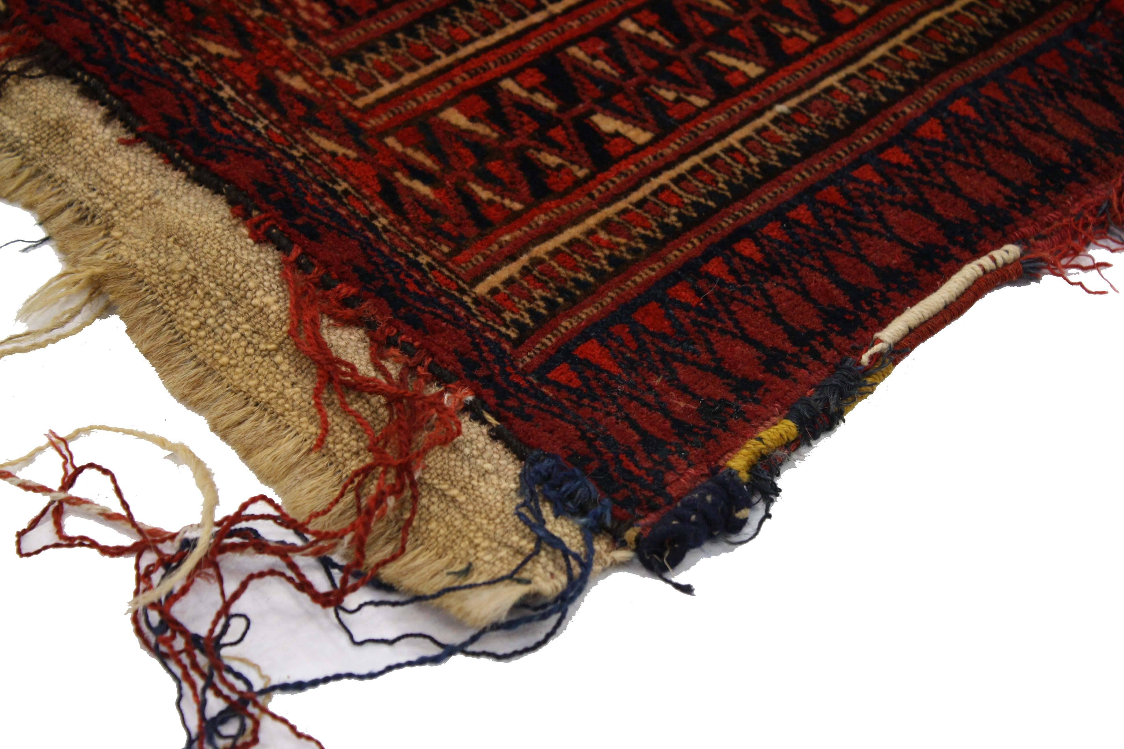 76639 Antique Afghan Turkoman Turkmen Torba bag, wall hanging, tribal textile tapestry. This hand knotted wool antique Afghan Turkmen Turkoman Torba storage bag features an all-over symmetrical geometric pattern of Gul motifs, possibly Tekke, Ersari
