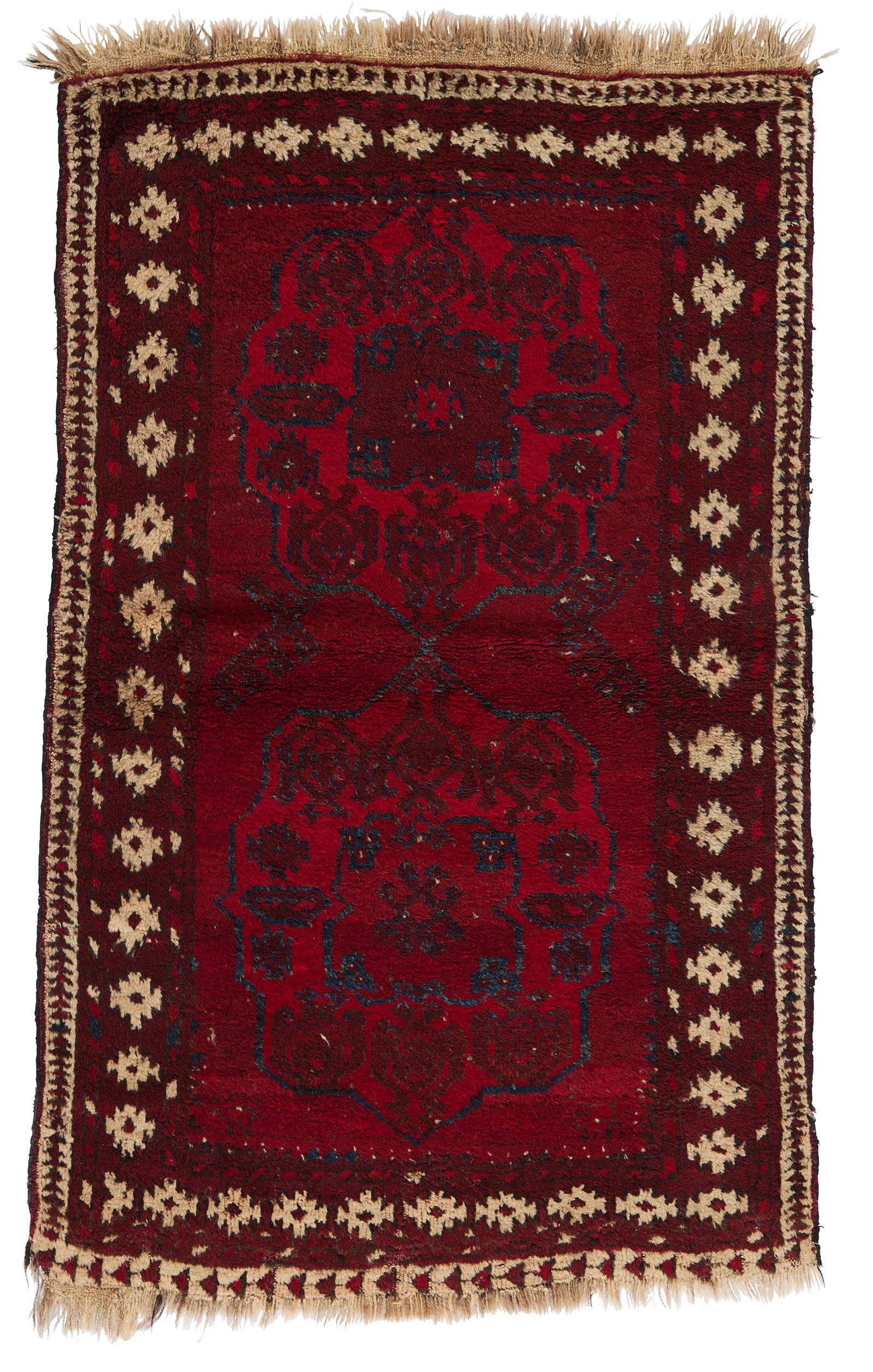 This one-of-a-kind ANTIQUE AFGHANI 3' X 5' rug was hand-woven of 100% wool in Afghanistan over 100 years ago. It has a double border in beige and floral motifs in the field, in red and black. Its excellent quality and great condition make it a