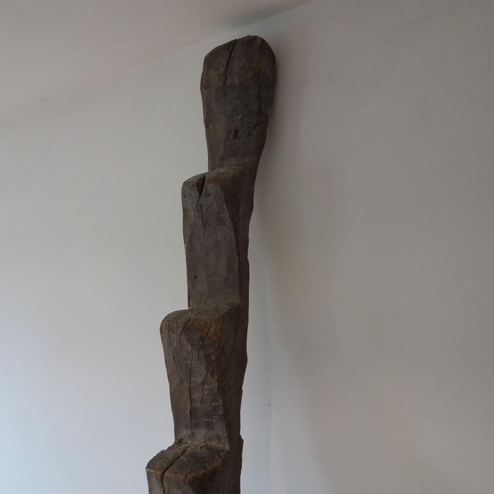 Magnificent tribal Dogon ladder from Africa. Fabulous sculptural piece carved from one piece of hardwood with wonderful Adze tool marks. Each step has been handcarved from the wood using an Adze tool. Dates from the 19th Century.

Very nicely