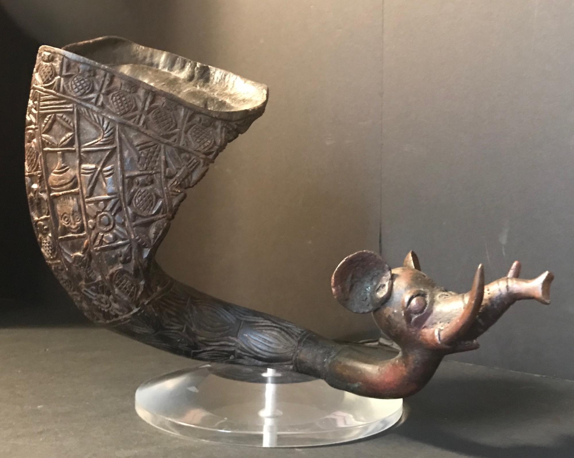 Antique African Royal ceremonial buffalo drinking horn Bamum “Ndu Nyiet”

This historic and spectacular Bamum royal drinking horn is known as “Ndu Nyiet”. It is carved, exquisitely, from buffalo horn and decorated overall in relief with geometric