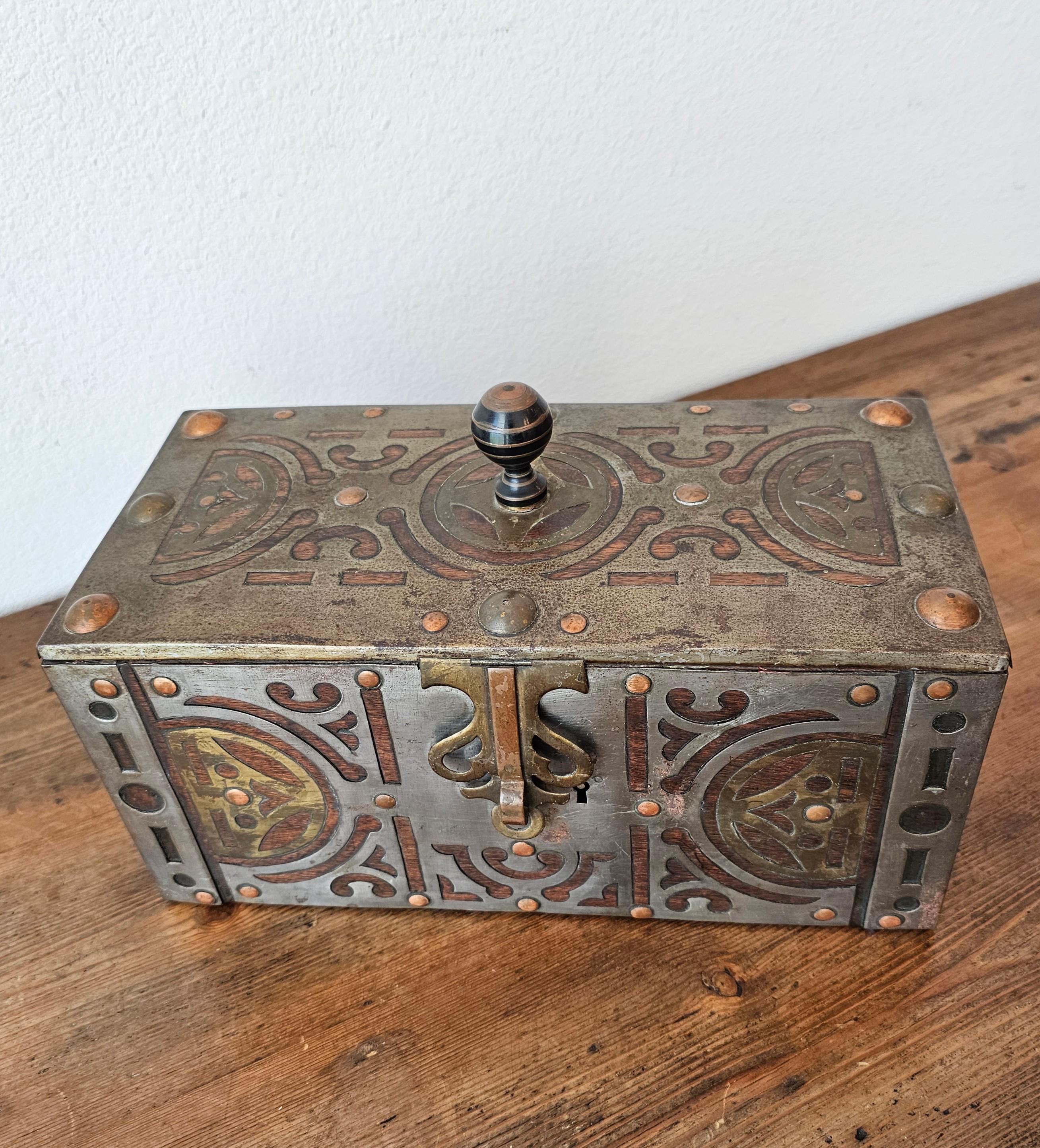 A scarce antique Tuareg peoples mixed metal mounted wooden table box. circa 1890 

A most impressive work, hand-crafted in Mauritania, Northwest Africa, at the turn of the late 19th / early 20th century, high-quality materials, construction, and