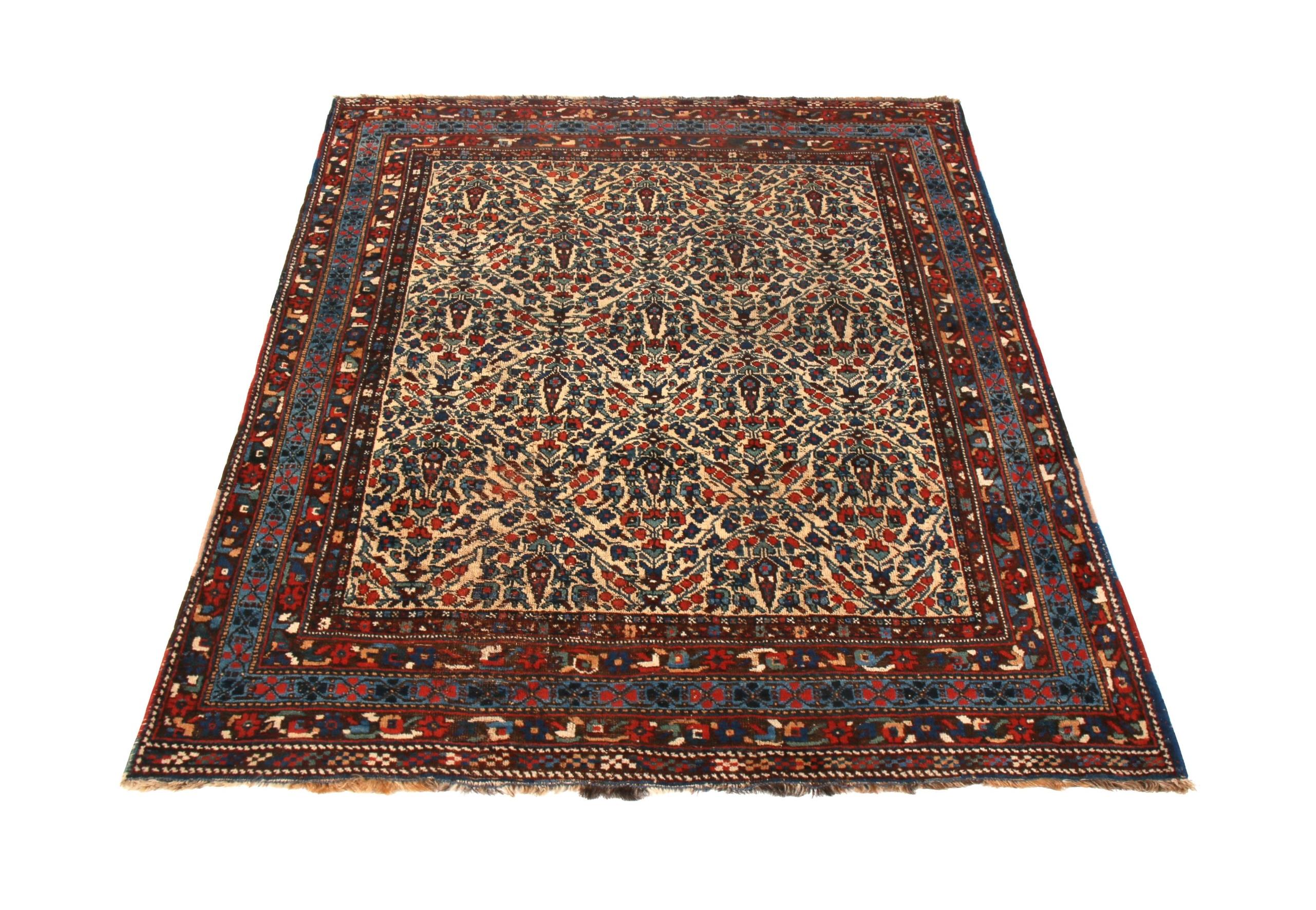 Made with hand knotted wool originating between 1880-1890, this antique Afshar Persian rug enjoys one of the most uniquely meticulous variations of the cypress tree motif, a celebrated representation of the acclaimed tree of life symbol believed to