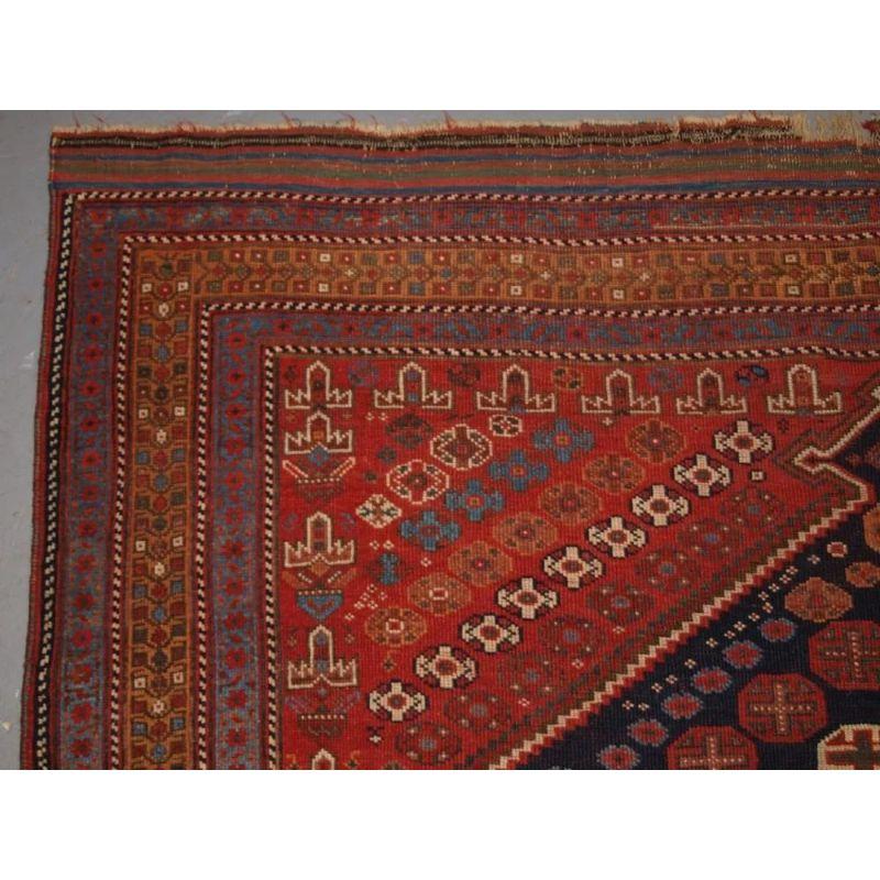 A South Persian Afshar rug of superb colour and design with very fine soft glossy wool. The medallion is of the traditional Afshar hexagonal shape with the small arrowheads at the ends. The medallion is filled with a lattice of small colourful