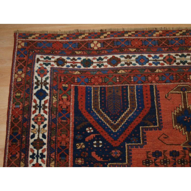 Antique Afshar Neriz Rug with Vase Design and Floral Spray In Excellent Condition For Sale In Moreton-In-Marsh, GB