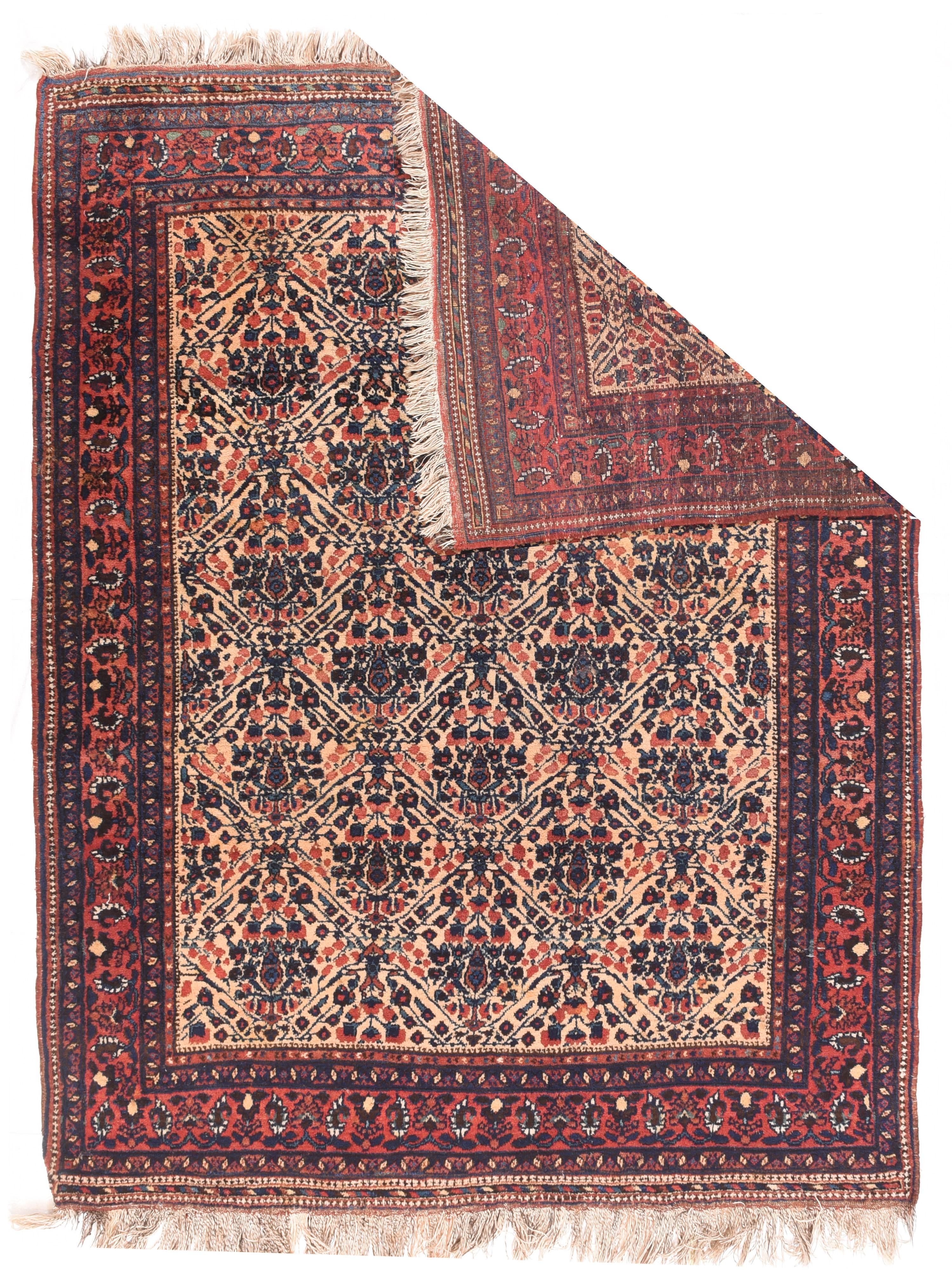 Now this is a true SE Persian antique tribal Afshar scatter with an ecru field displaying a lightly latticed one way half-drop, offset repeating cypress and floral pattern, within a coral rose border including botehs. Sumak stitch decorated extra