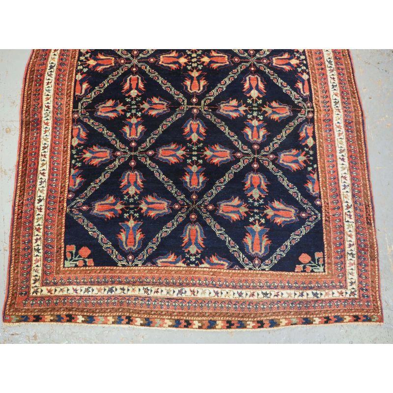 Antique Afshar Tribal Rug with Lattice and Flowering Tulip Design In Good Condition For Sale In Moreton-In-Marsh, GB