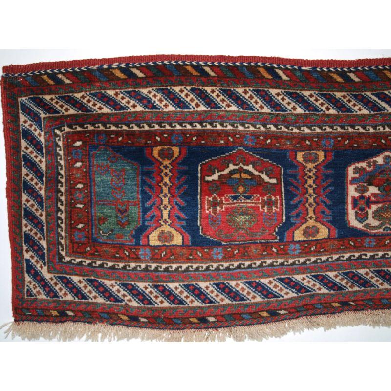 Antique piled mafrash panel by the Afshar tribe, a superb panel with outstanding colour.

This panel is probably the side panel from a bedding or storage bag. note the classic Afshar diagonal stripe border.

The panel is in excellent condition