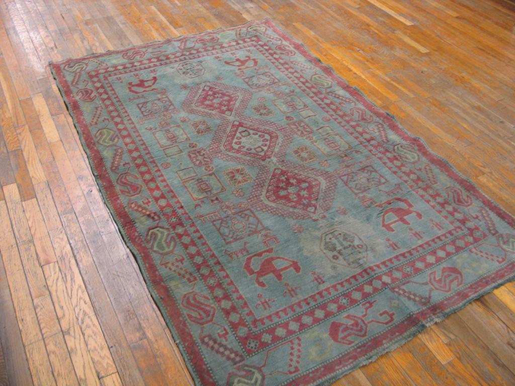 Antique Agra Cotton rug, measures: 4' 6” x 7' 0”.