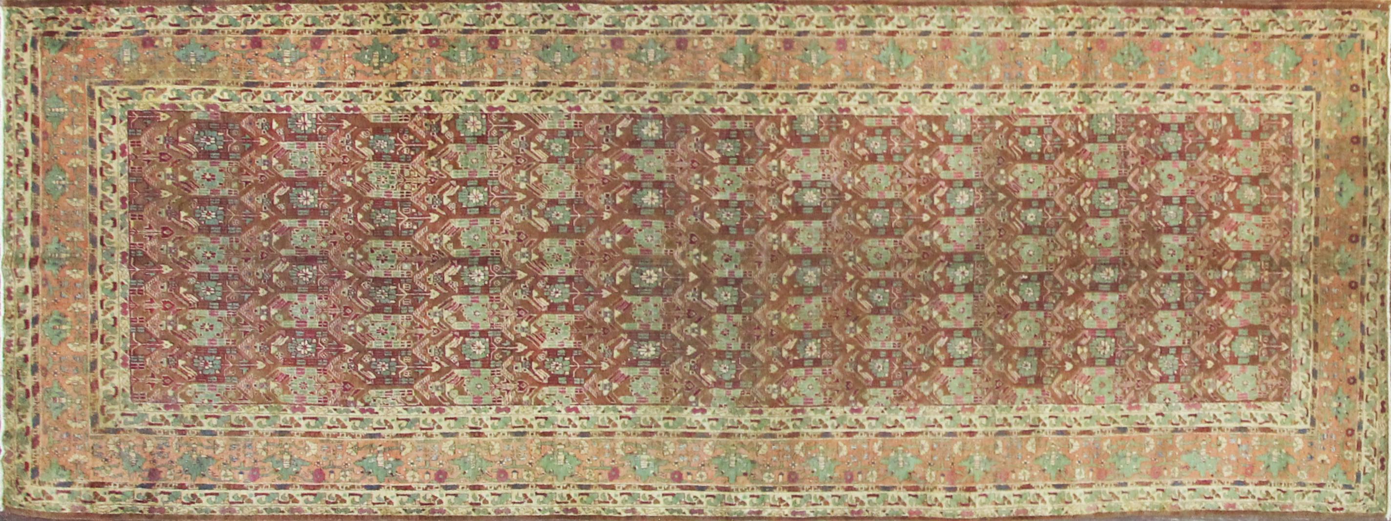 A gorgeous Agra gallery rug.
Agra is a large city and weaving district in North Central India that has been prolific in producing tightly knotted, decorative, floral rugs. Antique Agra rugs are renowned for their beauty of color, elegance of