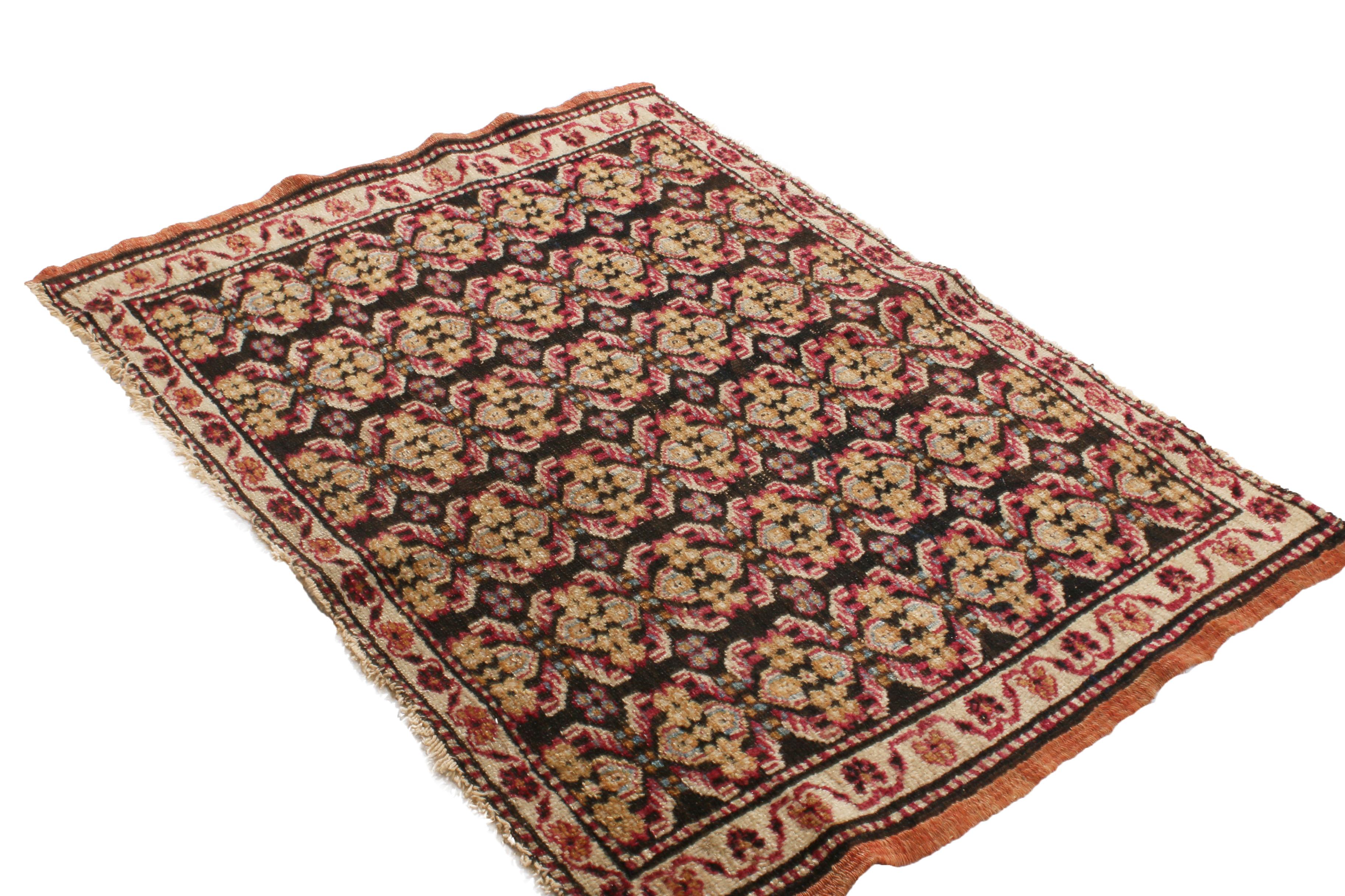 Hailing from India between 1890-1900, this hypnotic antique Agra rug is hand-knotted in high-quality wool with a hypnotic departure from traditional designs in its field. Emboldened by a partisan pairing of beige and red colorways against a black