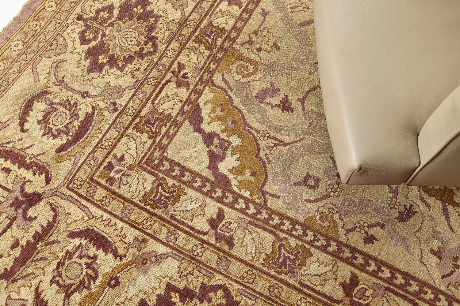 Get mesmerized by this Agra rug that features a transitional design that complements the motifs. Series of symmetrically golden leafy scrolls and tendrils, florets, and medallions are featured. Perfect for your traditional home interior that matches
