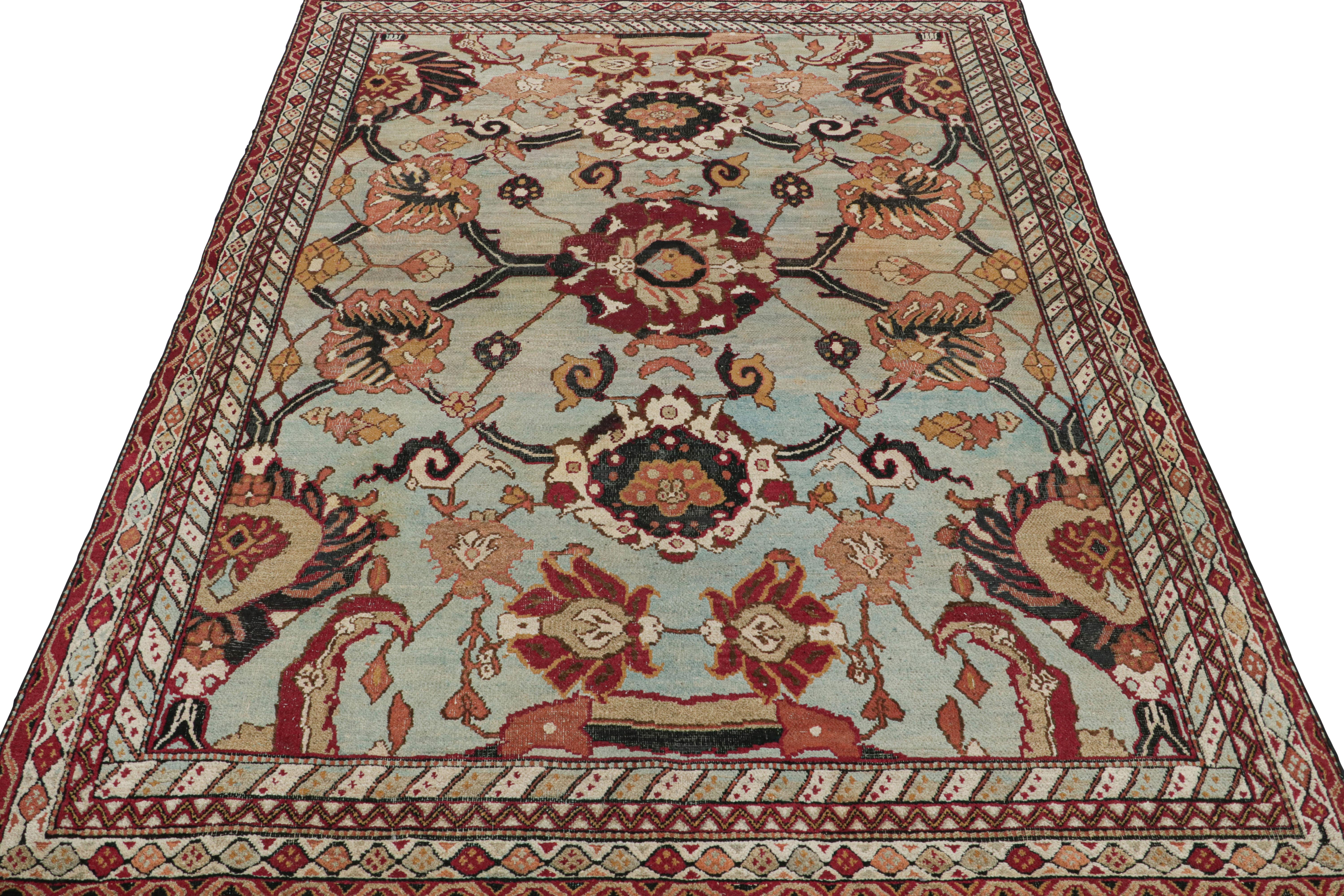 Hand-Knotted Antique Agra Rug in Blue with Floral Patterns For Sale
