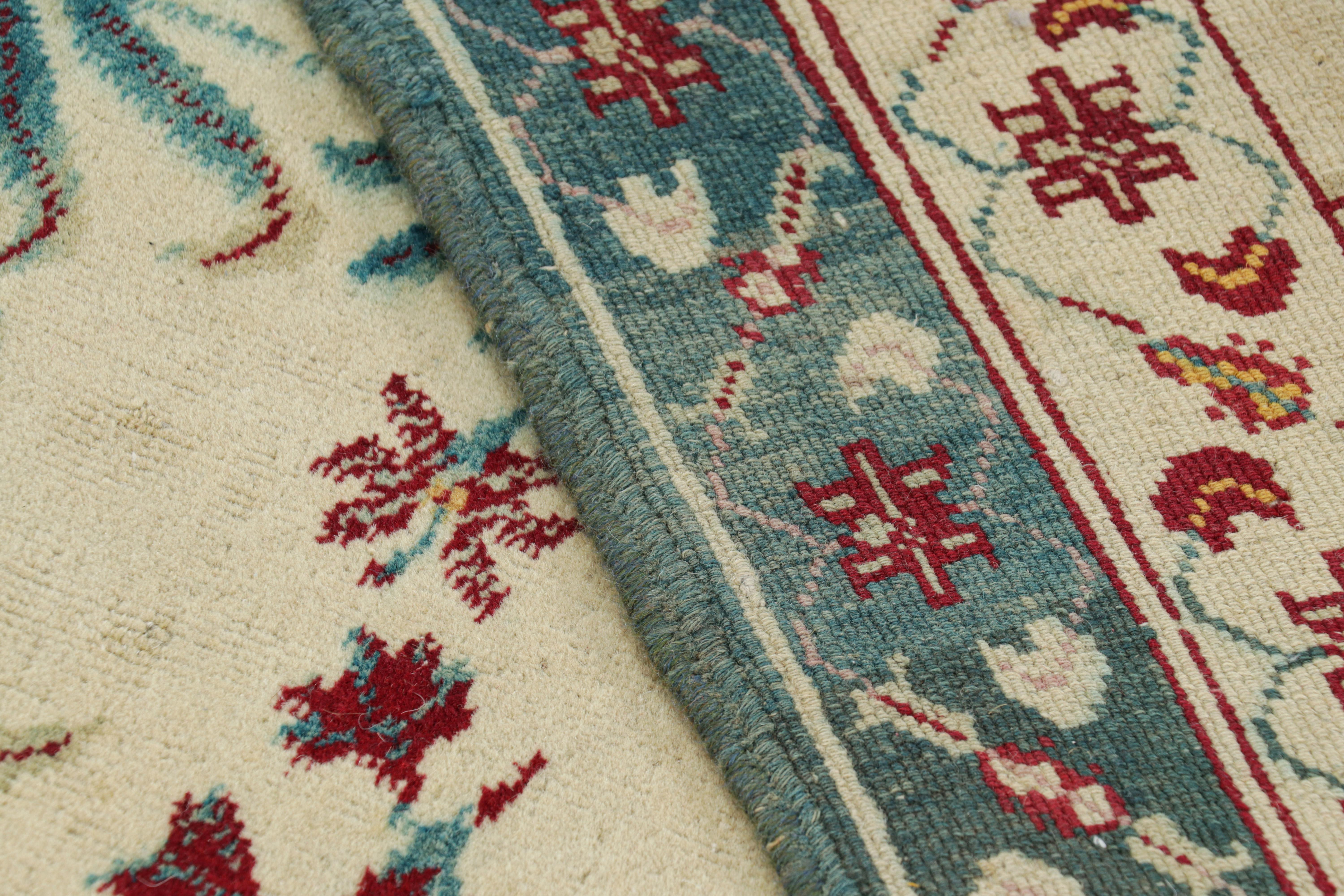 Laine Tapis Agra ancien crème avec motifs floraux bleu sarcelle  Rug & Kilim en vente