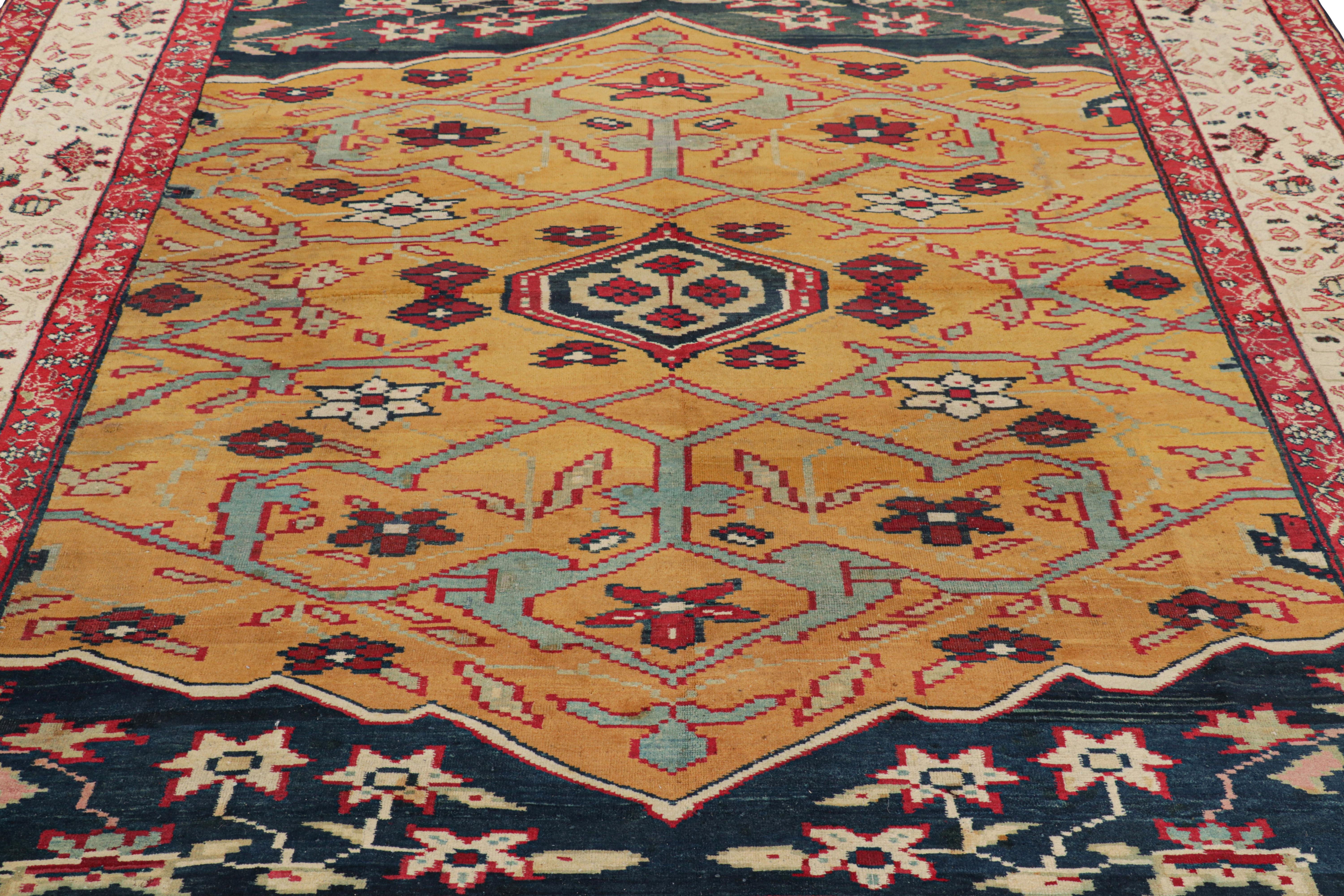 Hand-knotted in wool and originating from India circa 1920-1930, this 8×10 antique Agra rug is a rare and collectible jail rug, among the most exciting new additions to the Rug & Kilim Collection.

On the Design

A warm play of gold, red and blue
